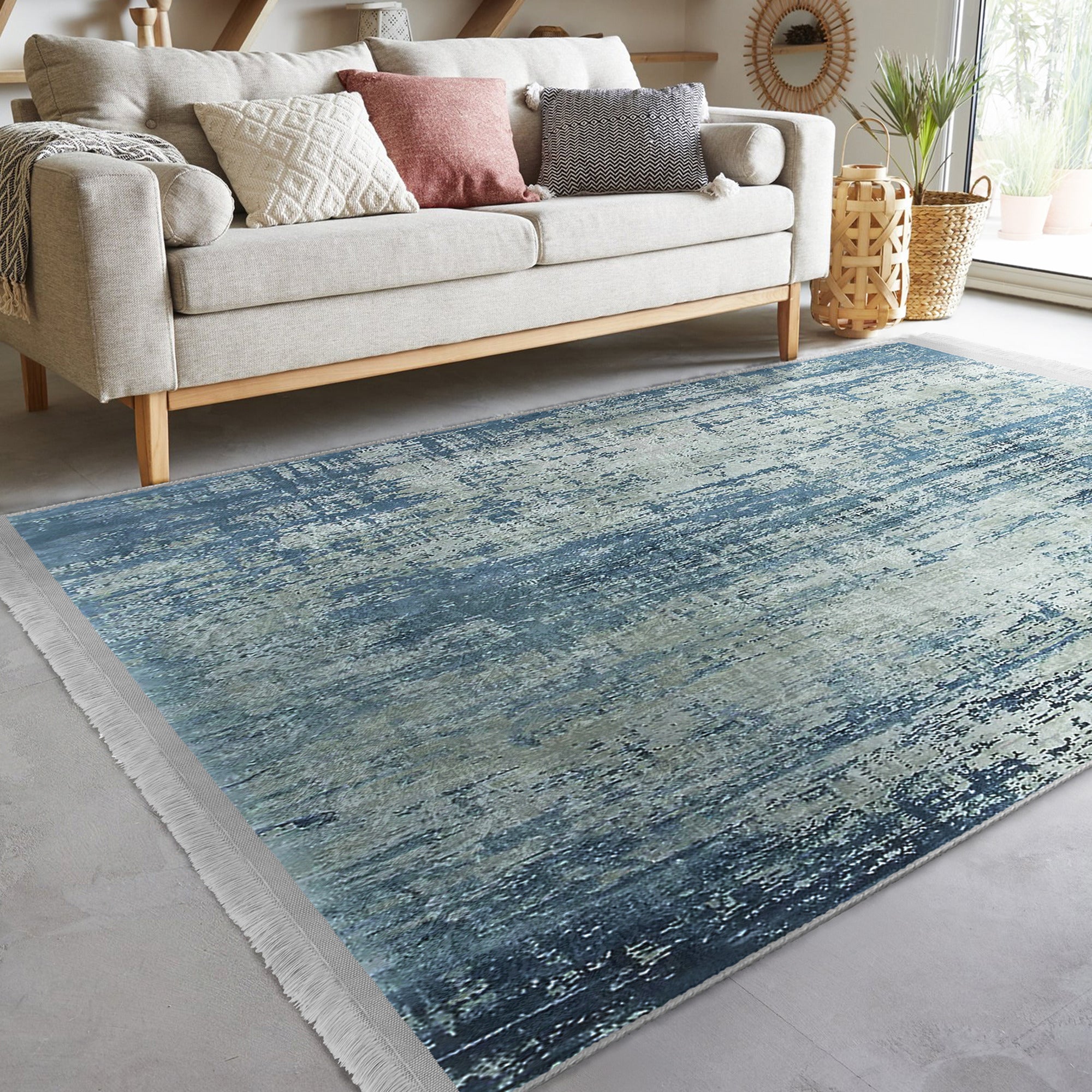 Blue Washable Area Rug by Homeezone featuring a stylish blue pattern and fringes, perfect for any room.