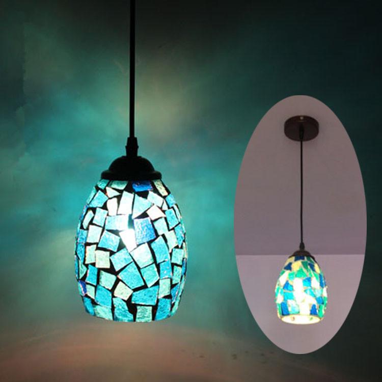 Bohemia Macek pendant light showcasing Tiffany design with glass and iron materials, available in various colors.