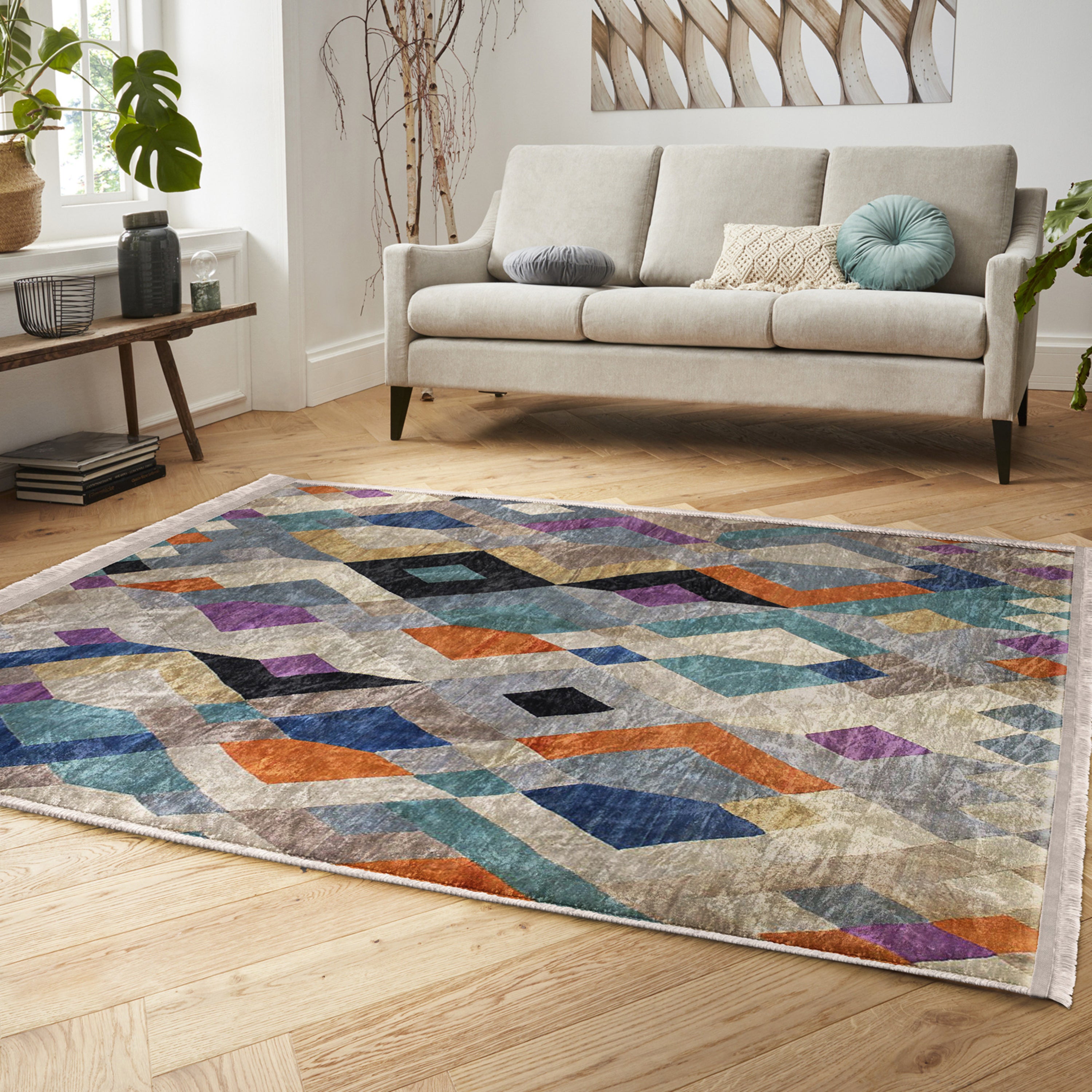 Bohemian Home Decor Washable Area Rug with fringes, showcasing a stylish design in a cozy living room setting.