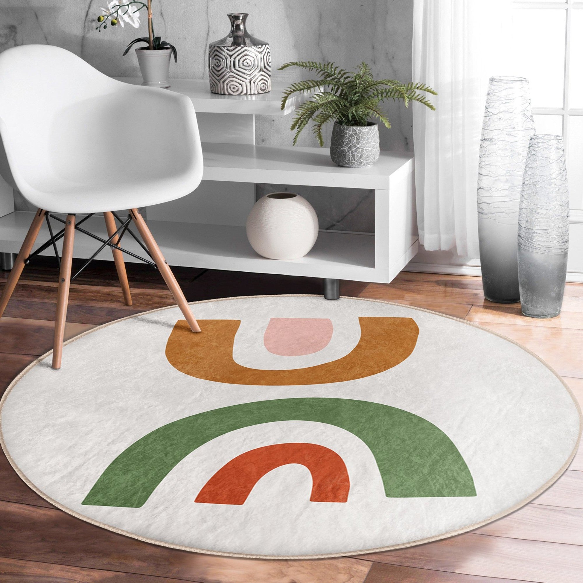 A beautifully designed Bohemian round rug featuring intricate patterns and vibrant colors, perfect for home decor.