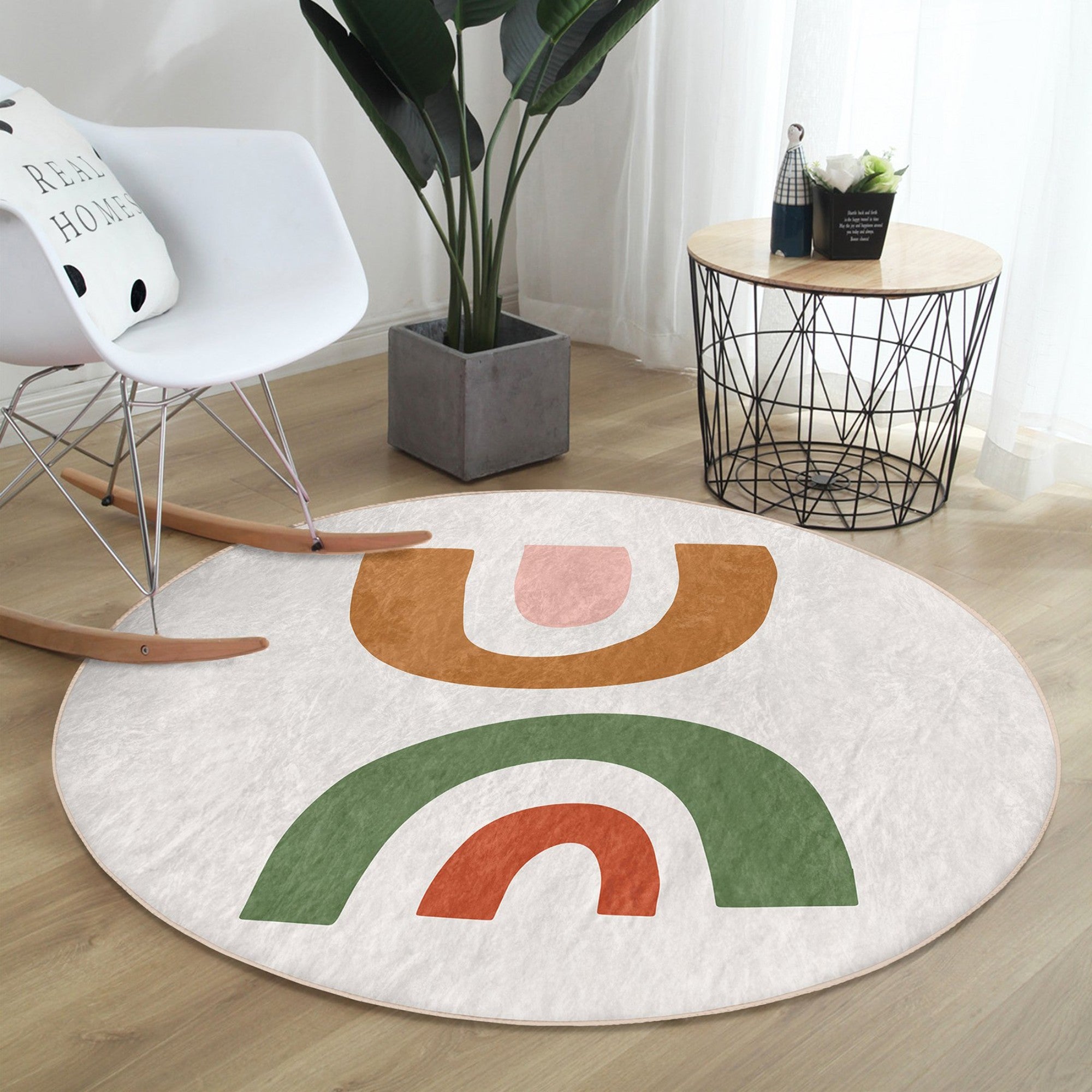 A beautifully designed Bohemian round rug featuring intricate patterns and vibrant colors, perfect for home decor.