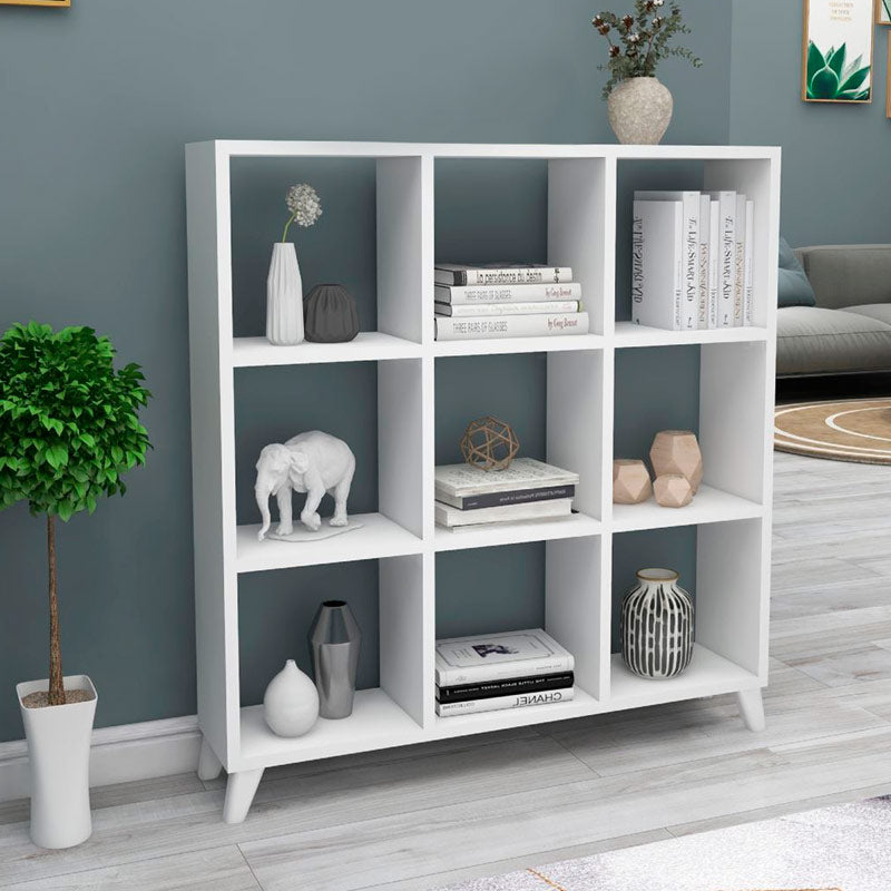 Modern white Bookcase CLARISSA with cube-style design, showcasing multiple shelves and a sleek finish.