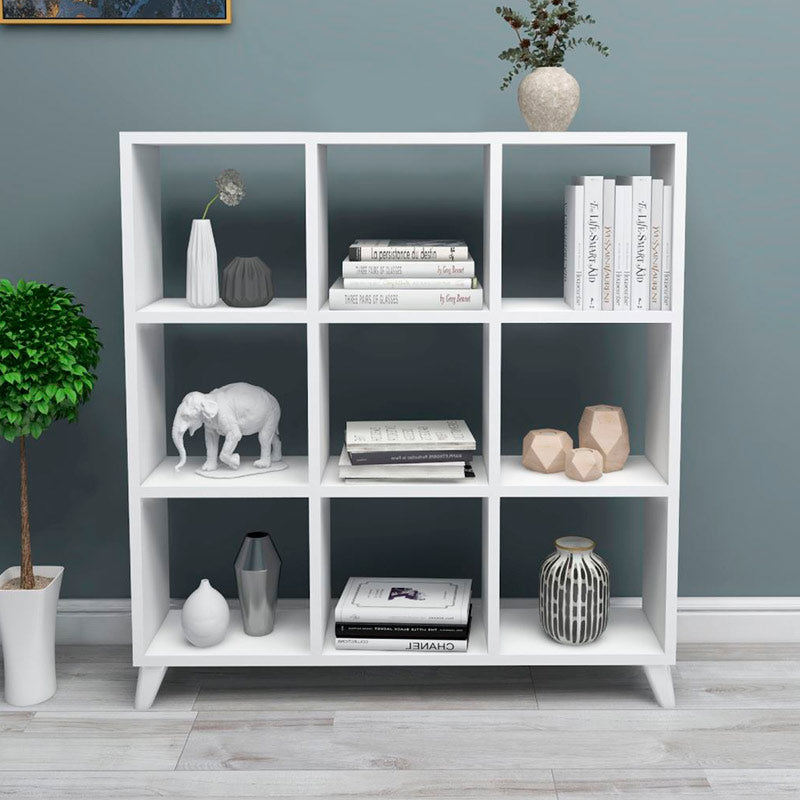 Modern white Bookcase CLARISSA with cube-style design, showcasing multiple shelves and a sleek finish.