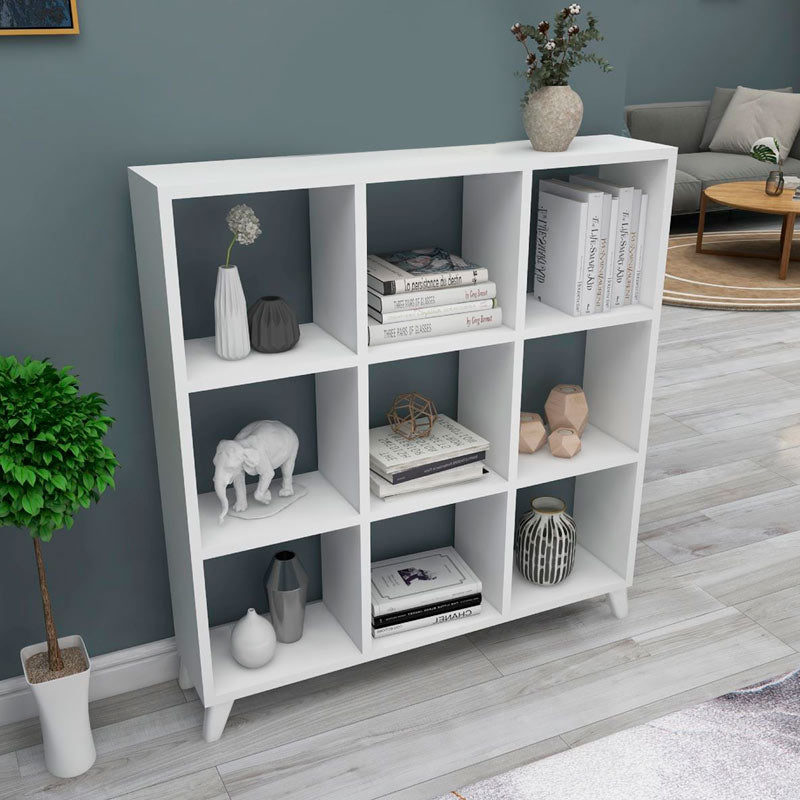 Modern white Bookcase CLARISSA with cube-style design, showcasing multiple shelves and a sleek finish.