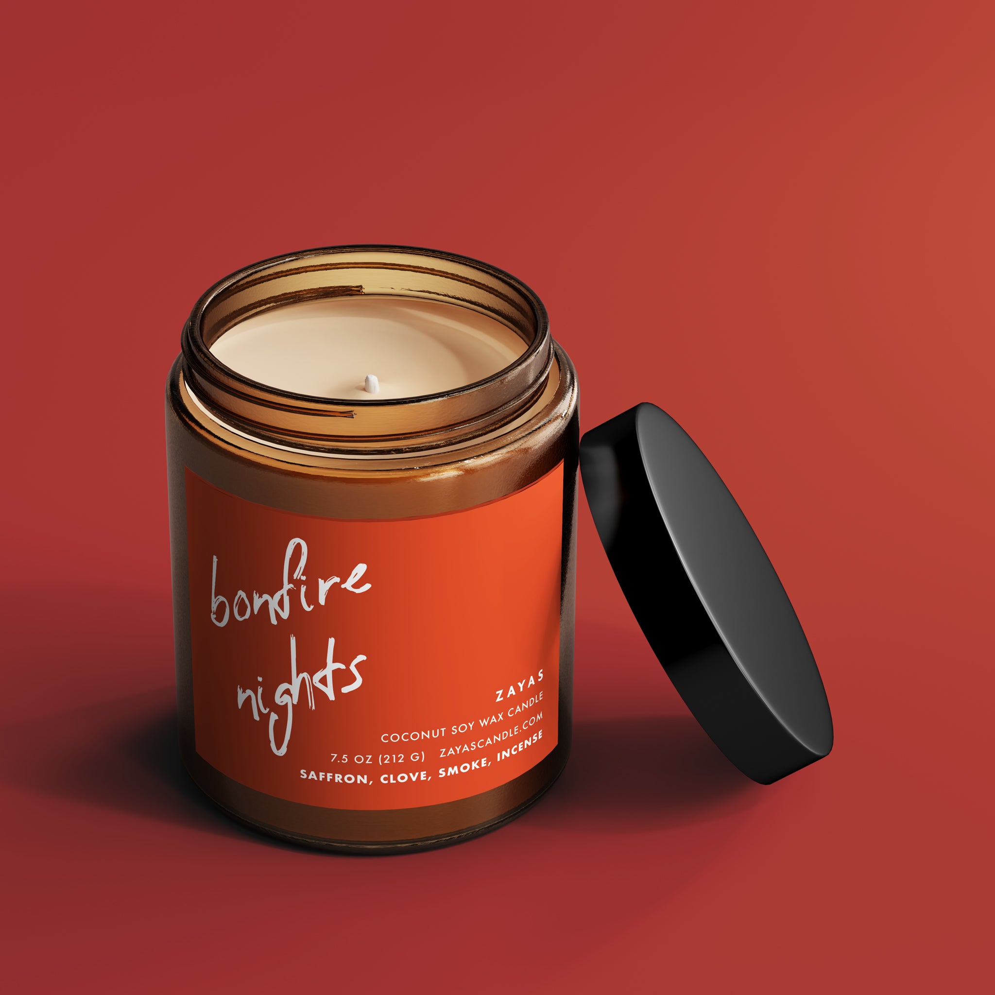 Bonfire Nights candle in a reusable glass jar, featuring a cotton wick and rich saffron and clove scent.