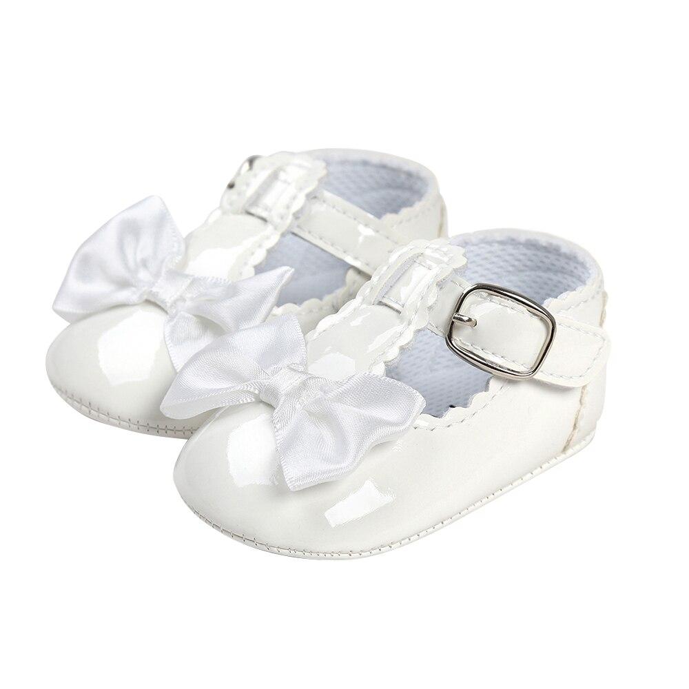 Born Baby Girl Shoes featuring a stylish bowknot design, made from PU leather with a rubber outsole, perfect for toddlers.