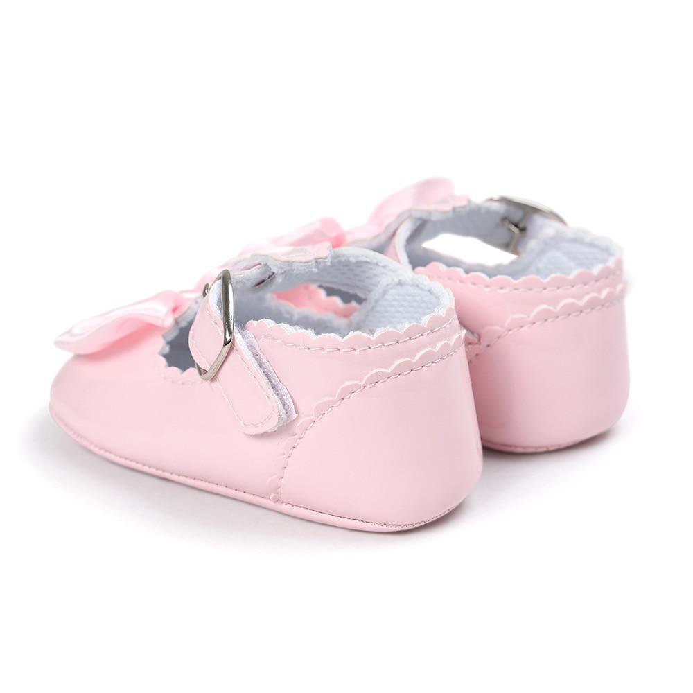 Born Baby Girl Shoes featuring a stylish bowknot design, made from PU leather with a rubber outsole, perfect for toddlers.