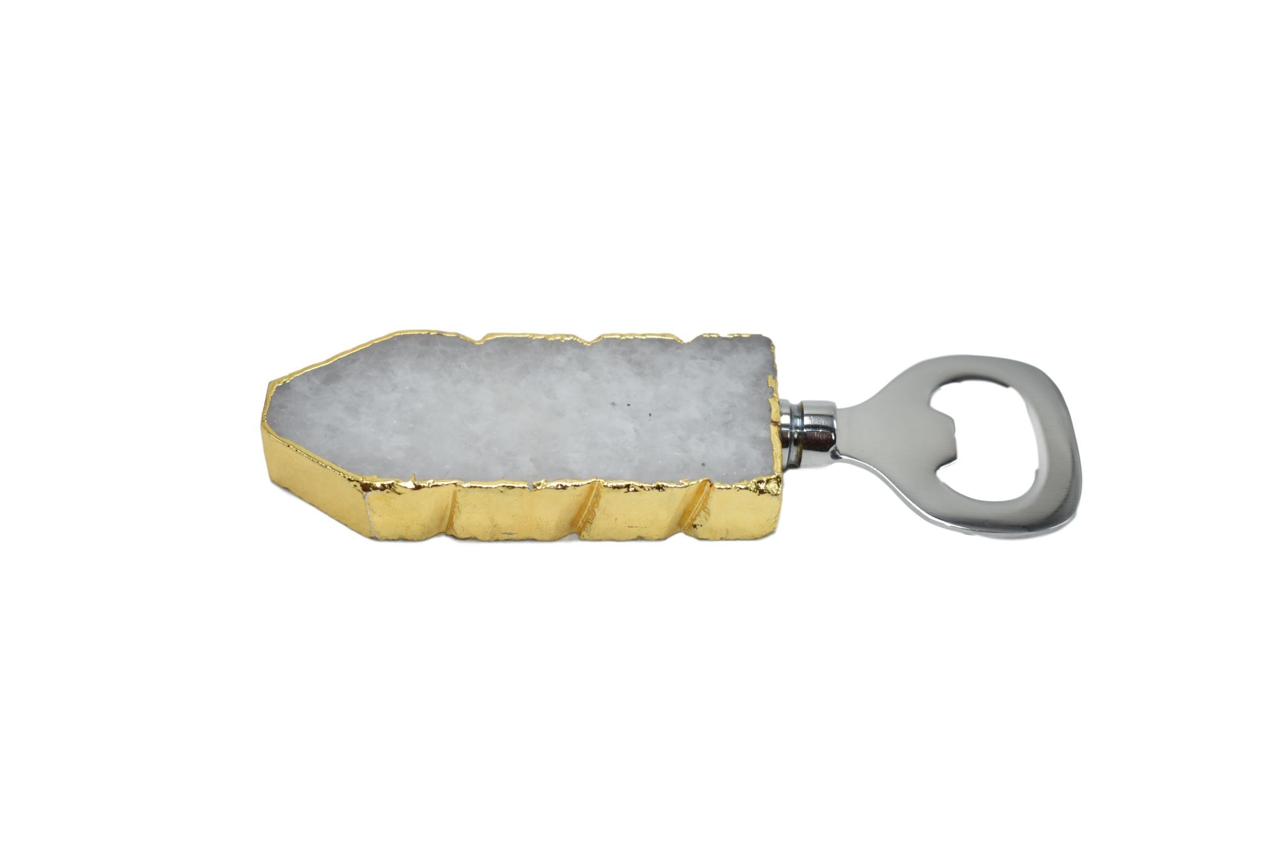 Luxurious bottle opener featuring gold trim and sparkling quartz handle, perfect for elegant entertaining.