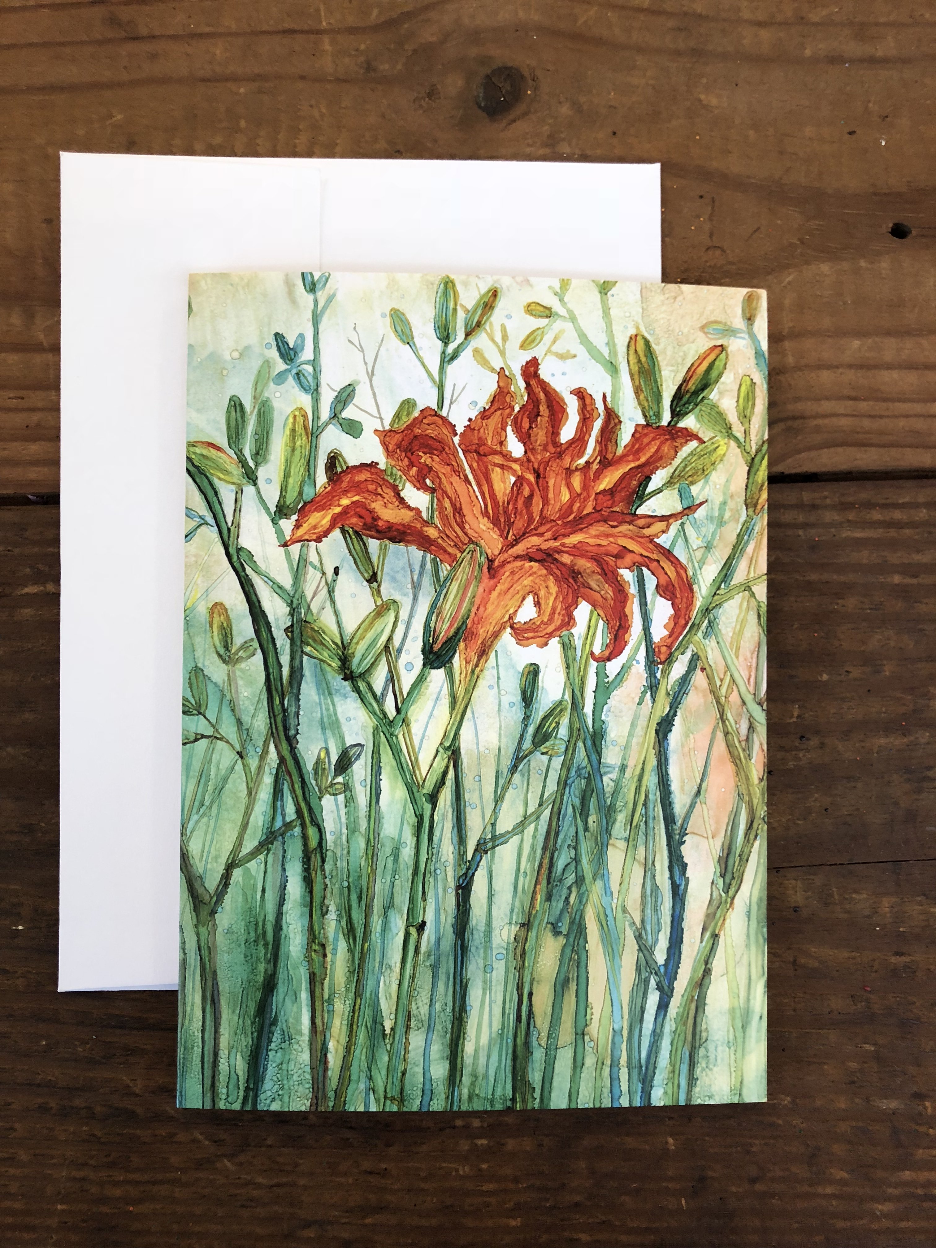 A beautifully arranged box set of 6 greeting cards featuring original flower paintings including Thistles, Daylily, Rose, and Magnolia.