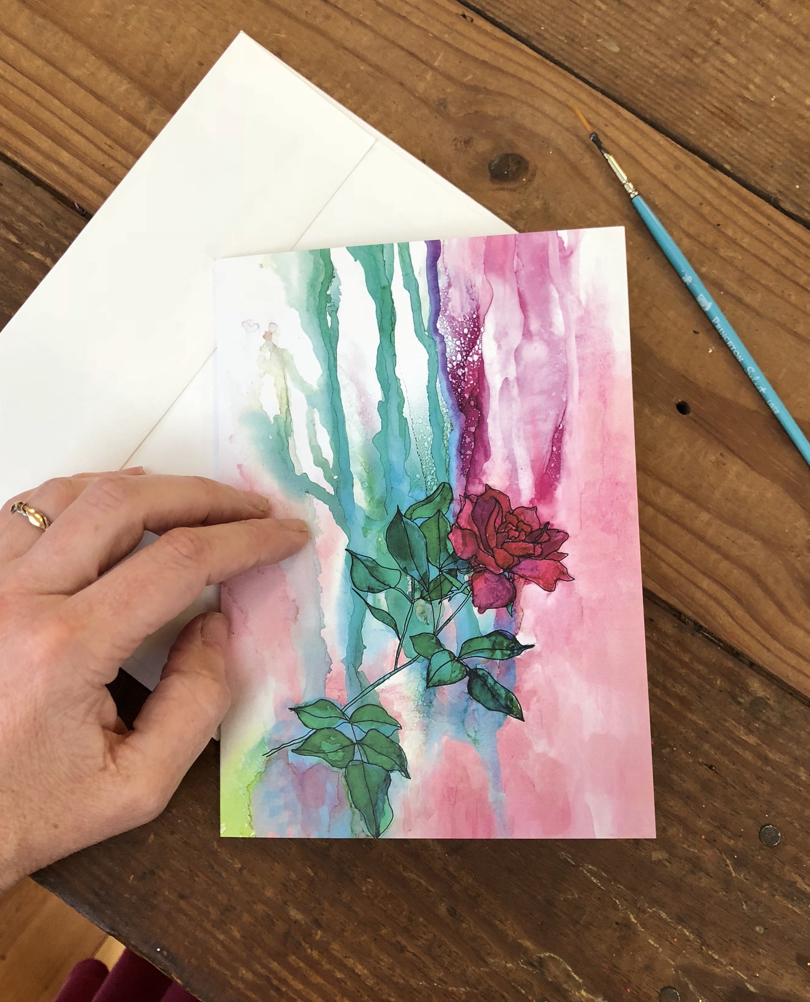 A beautifully arranged box set of 6 greeting cards featuring original flower paintings including Thistles, Daylily, Rose, and Magnolia.