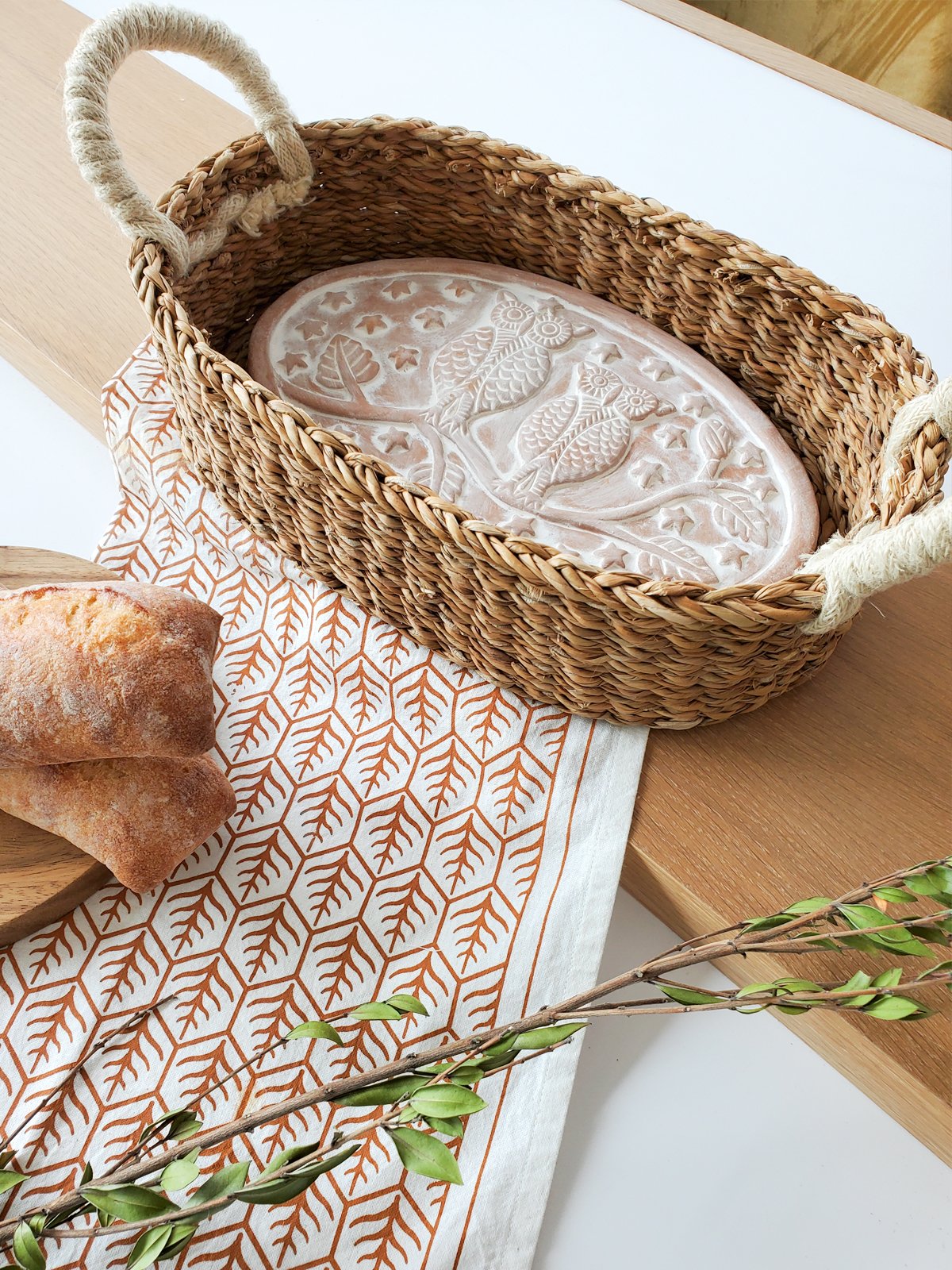 Owl Oval Bread Warmer and Basket set made from terracotta and seagrass, featuring an engraved owl design.