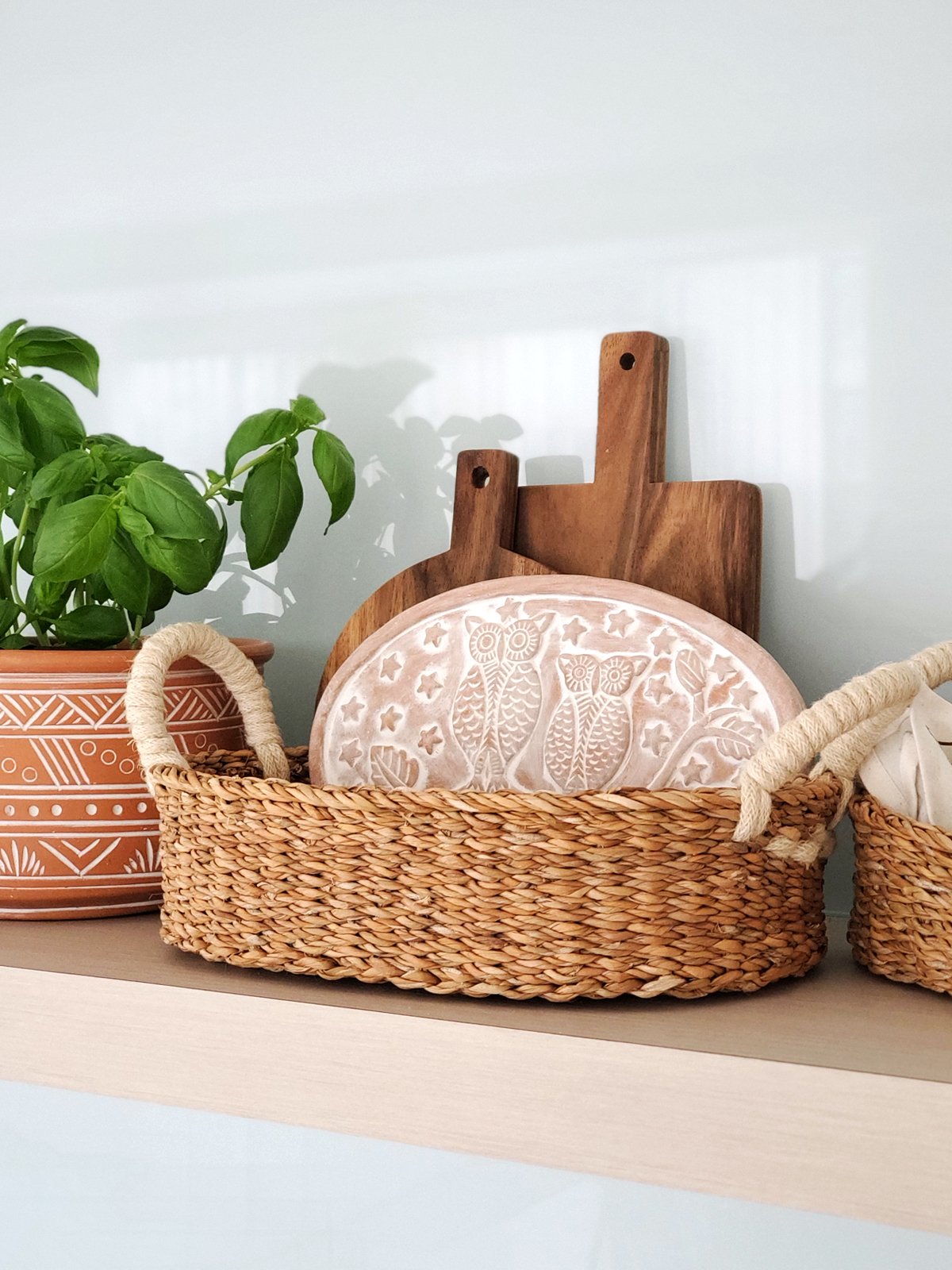 Owl Oval Bread Warmer and Basket set made from terracotta and seagrass, featuring an engraved owl design.