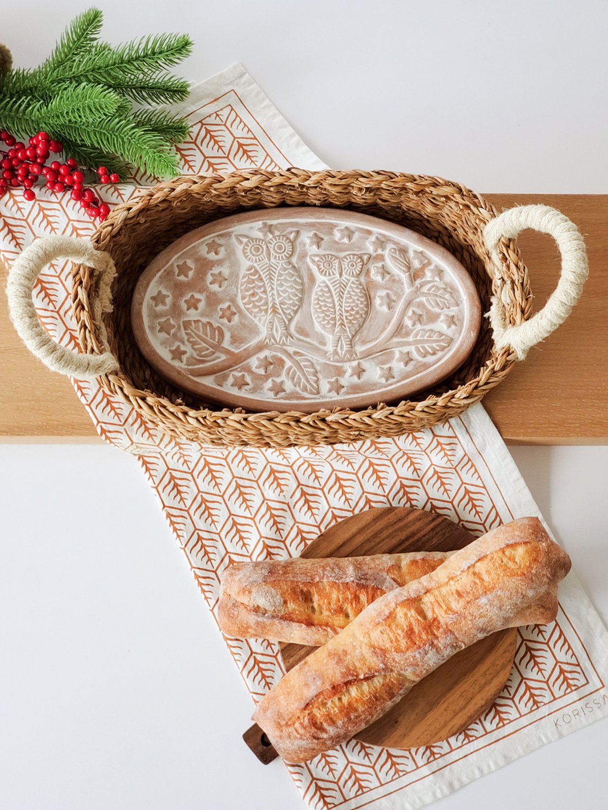 Owl Oval Bread Warmer and Basket set made from terracotta and seagrass, featuring an engraved owl design.