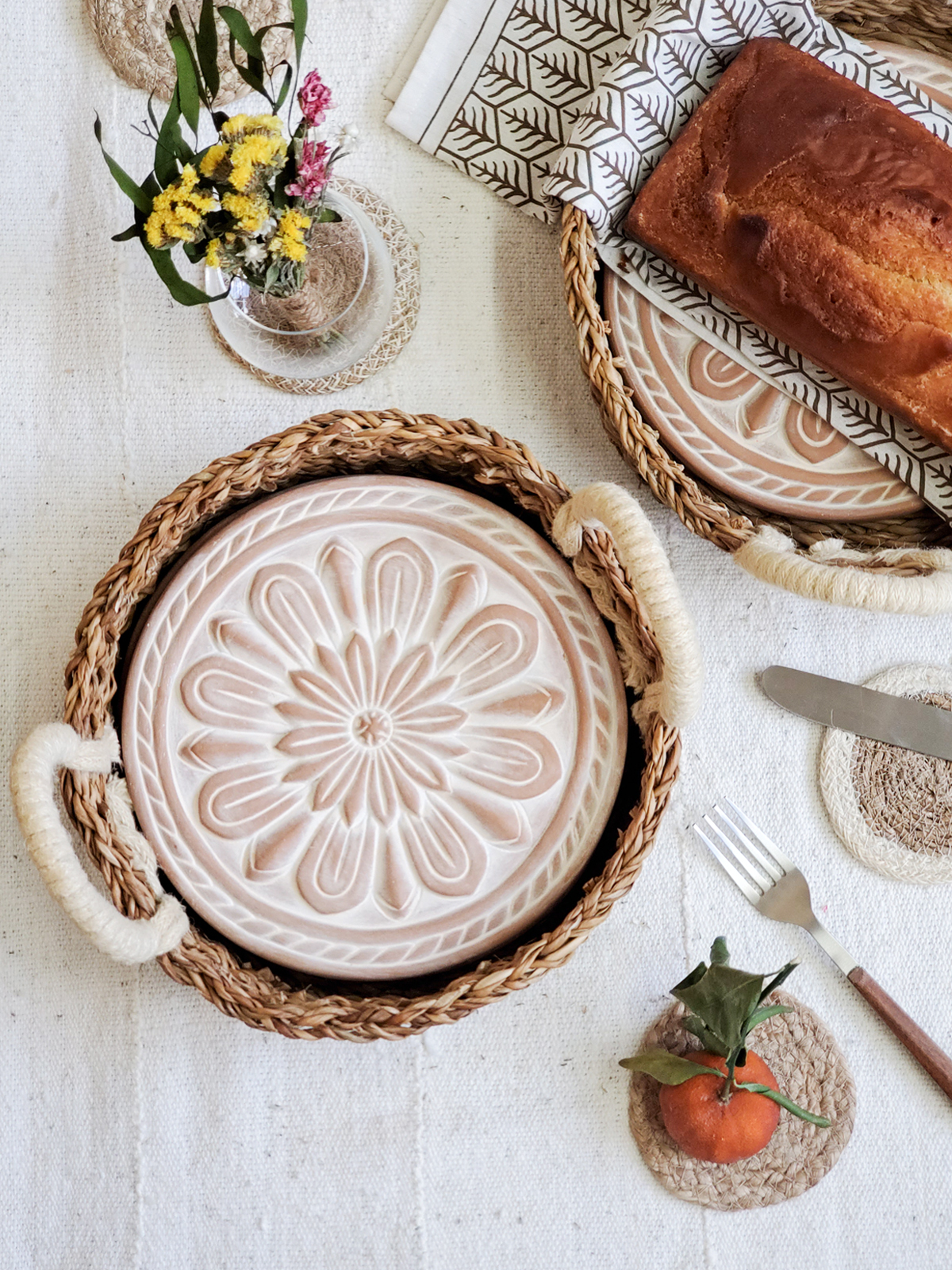 Vintage Flower Bread Warmer and Basket set featuring a terracotta plate with an owl design and a handwoven seagrass basket.