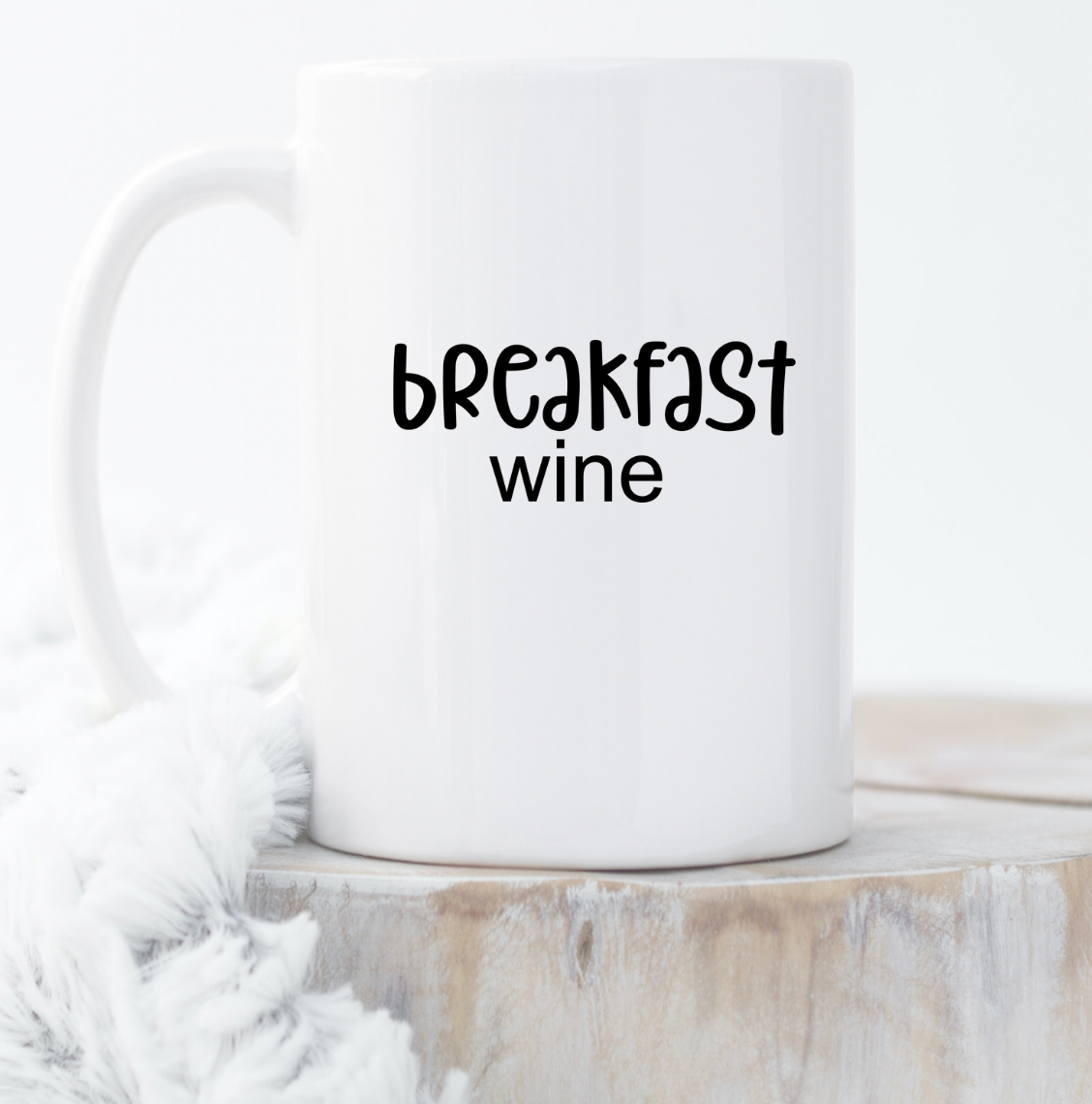 A glossy white 15oz ceramic mug with a vivid print, perfect for coffee or tea.