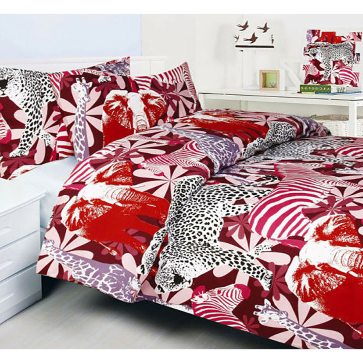 Bright Young Things Jungle Red Quilt Cover Set featuring vibrant animal prints including elephants, zebras, giraffes, and jaguars.