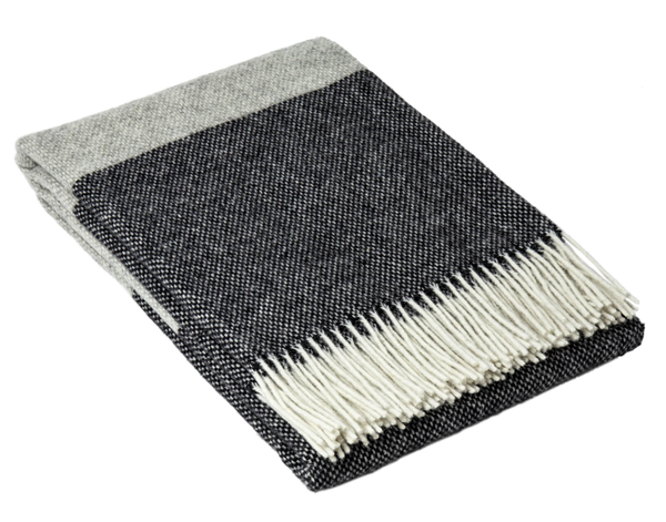 Brighton Throw blanket made from 100% New Zealand wool, featuring a stylish monochrome design, perfect for adding warmth and elegance to any space.