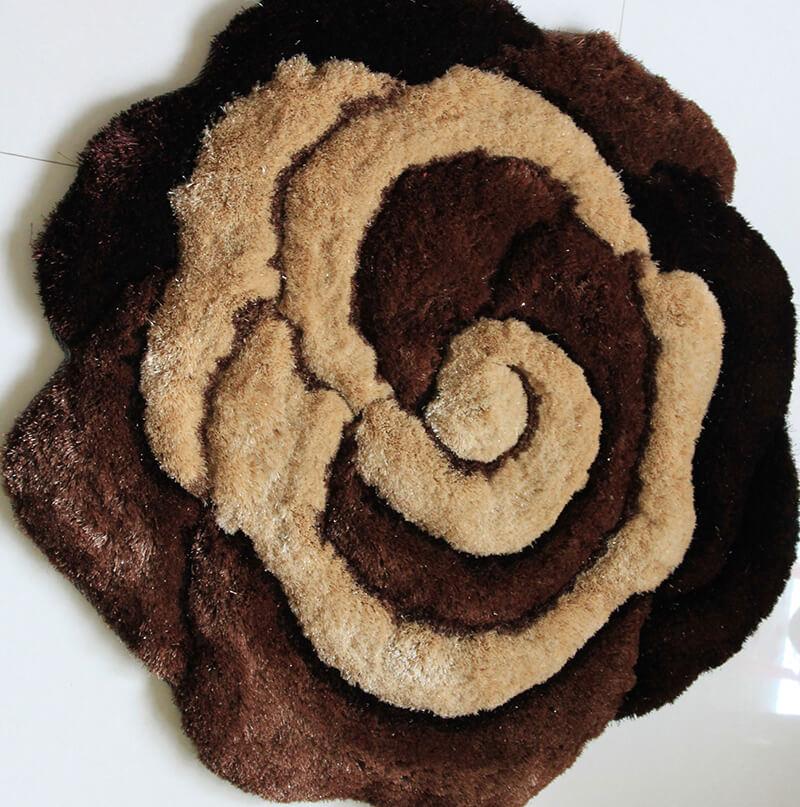 Brown and beige flower decorative rug with a soft shaggy texture, perfect for enhancing home decor.