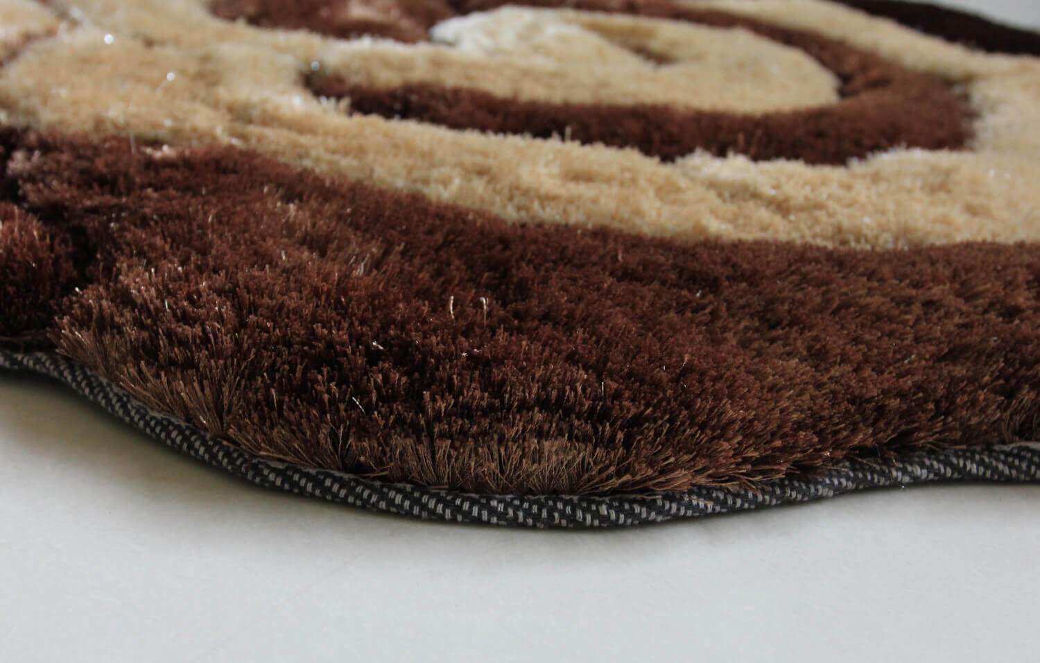 Brown and beige flower decorative rug with a soft shaggy texture, perfect for enhancing home decor.