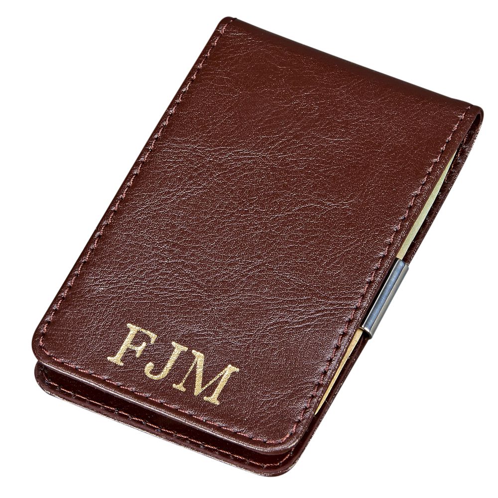 Brown leather billfold style case with money clip, showcasing its elegant design and compact size.