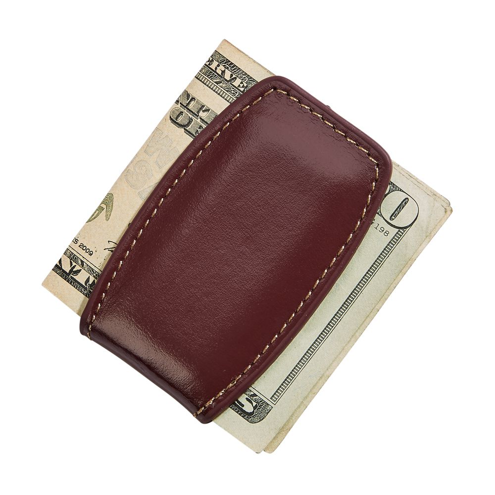 Brown leather money clip with embedded magnets and detailed stitching, elegantly designed for secure cash holding.