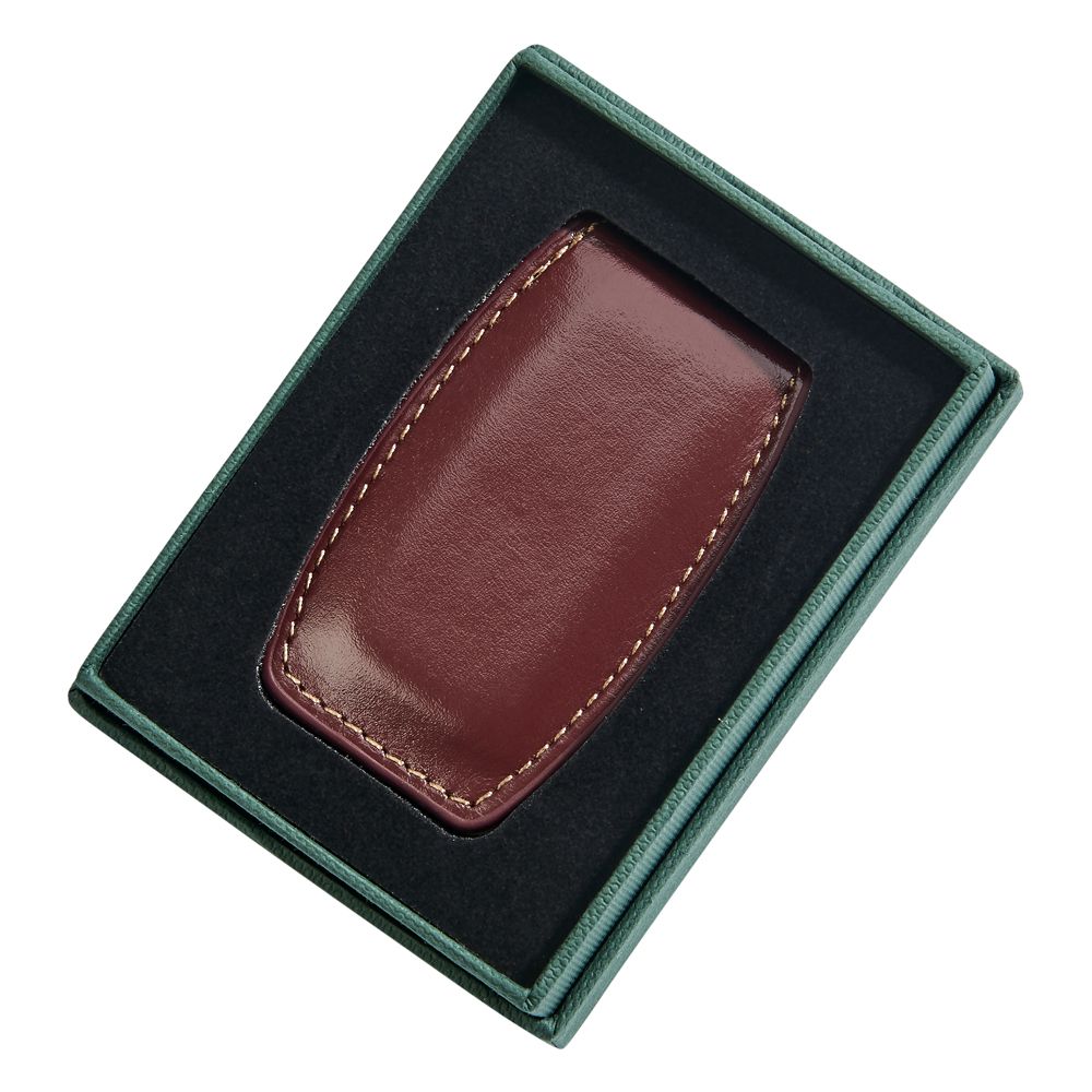 Brown leather money clip with embedded magnets and detailed stitching, elegantly designed for secure cash holding.