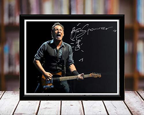 Framed Bruce Springsteen autograph replica print in black metal frame, showcasing a vibrant image of the artist.