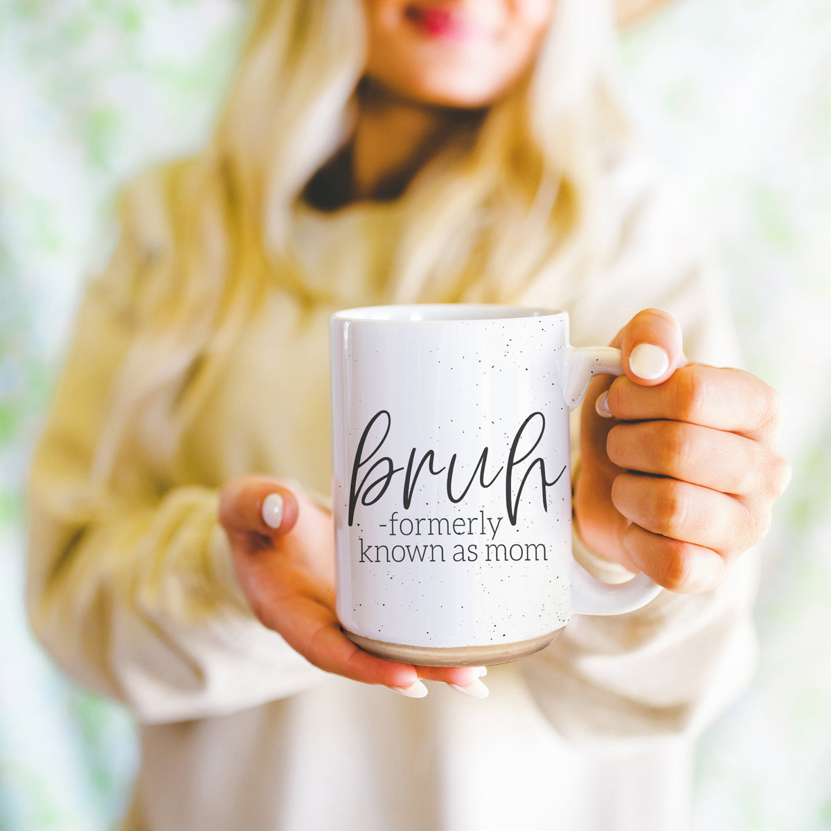 Bruh 16oz ceramic mug with humorous graphic design, off white color with dark speckles, perfect for coffee or tea.