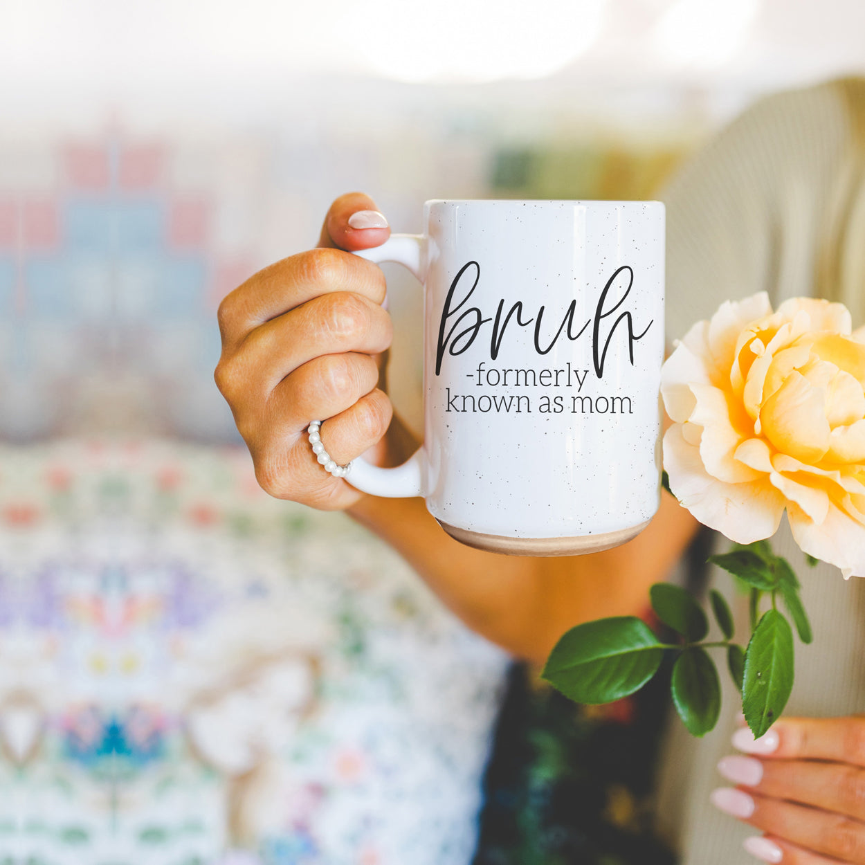 Bruh 16oz ceramic mug with humorous graphic design, off white color with dark speckles, perfect for coffee or tea.