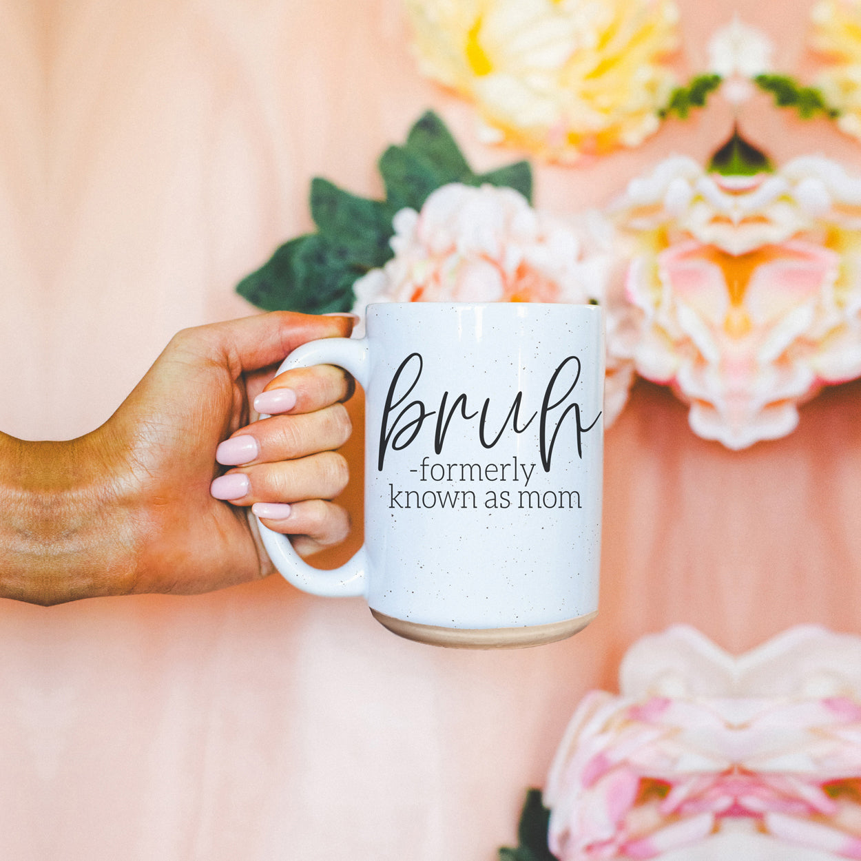 Bruh 16oz ceramic mug with humorous graphic design, off white color with dark speckles, perfect for coffee or tea.