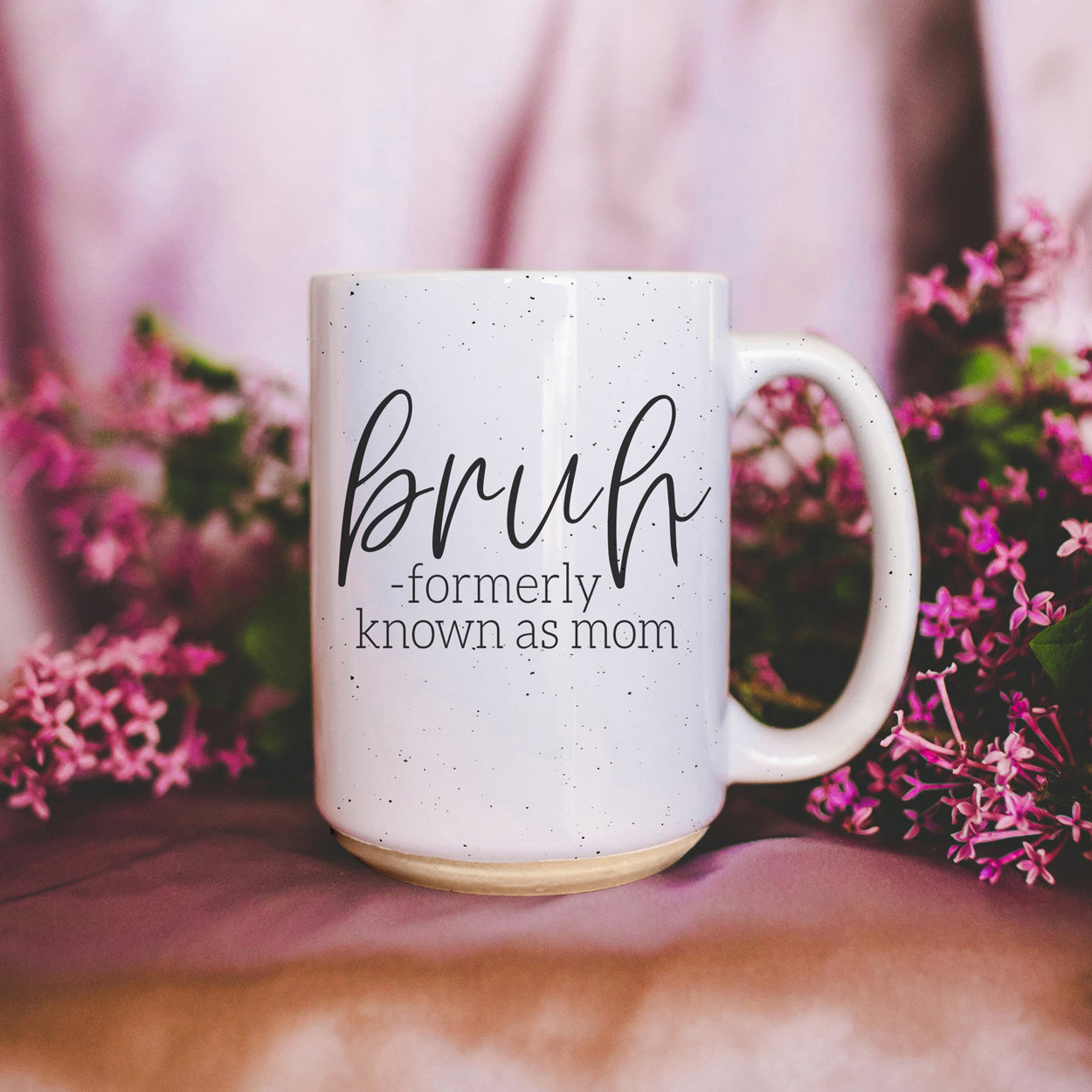 Bruh 16oz ceramic mug with humorous graphic design, off white color with dark speckles, perfect for coffee or tea.