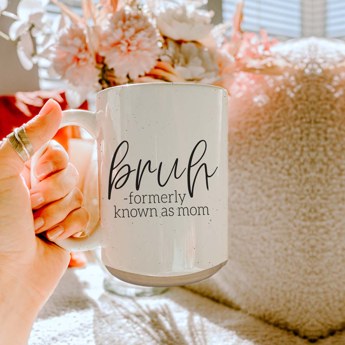 Bruh 16oz ceramic mug with humorous graphic design, off white color with dark speckles, perfect for coffee or tea.