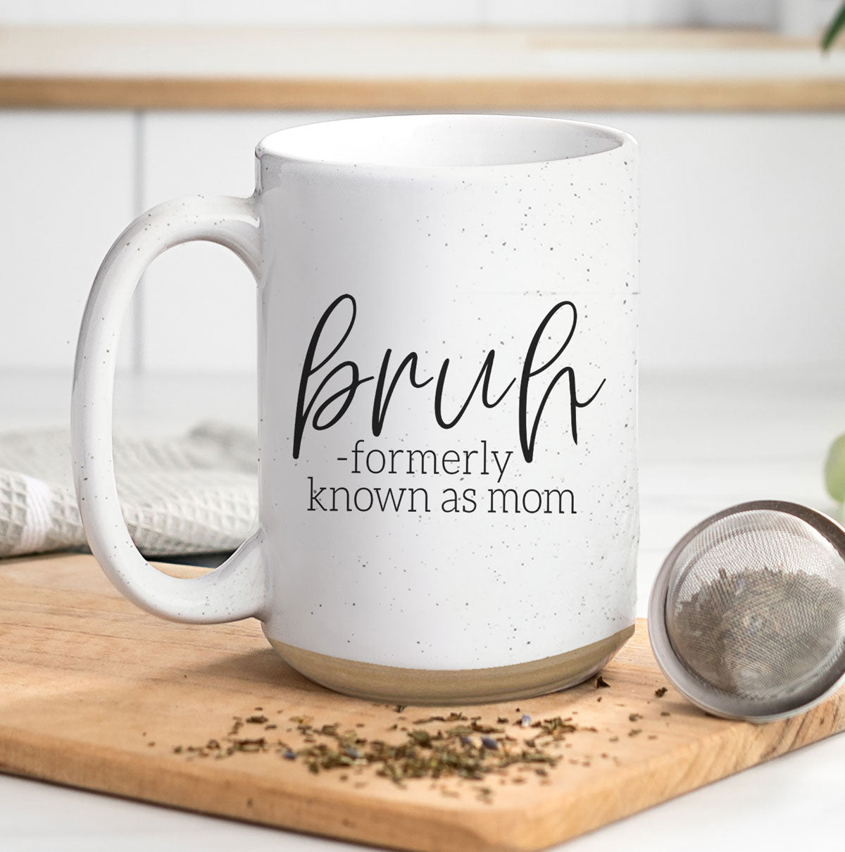 Bruh 16oz ceramic mug with humorous graphic design, off white color with dark speckles, perfect for coffee or tea.