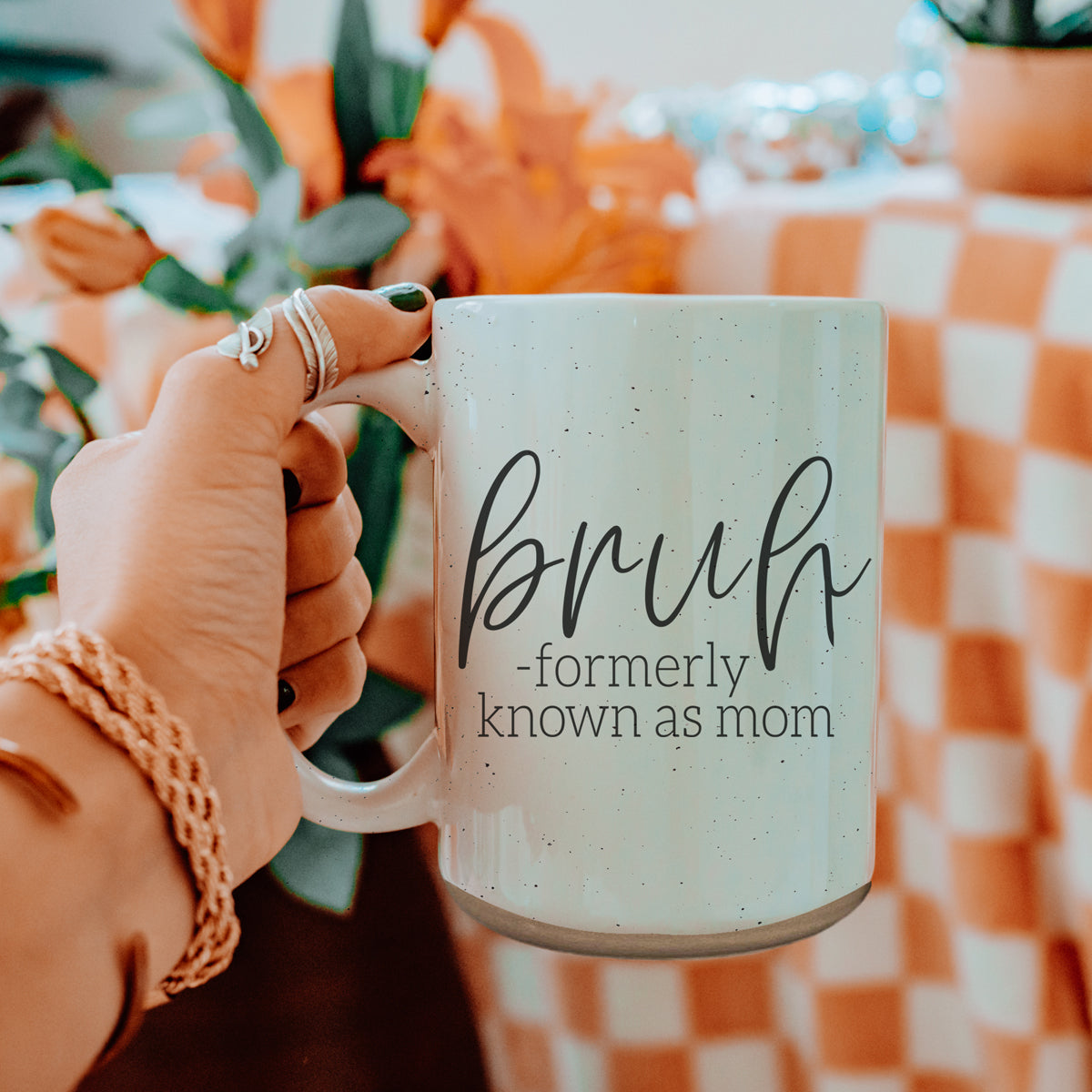 Bruh 16oz ceramic mug with humorous graphic design, off white color with dark speckles, perfect for coffee or tea.