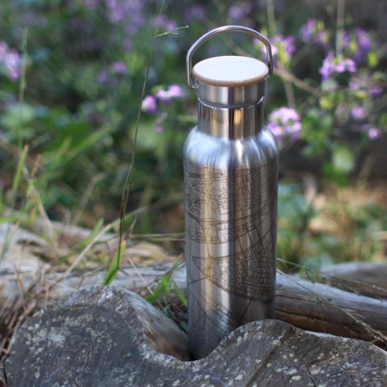 20oz stainless steel bottle featuring a custom engraved map of Buffalo, New York with a bamboo top, showcasing its sleek design.