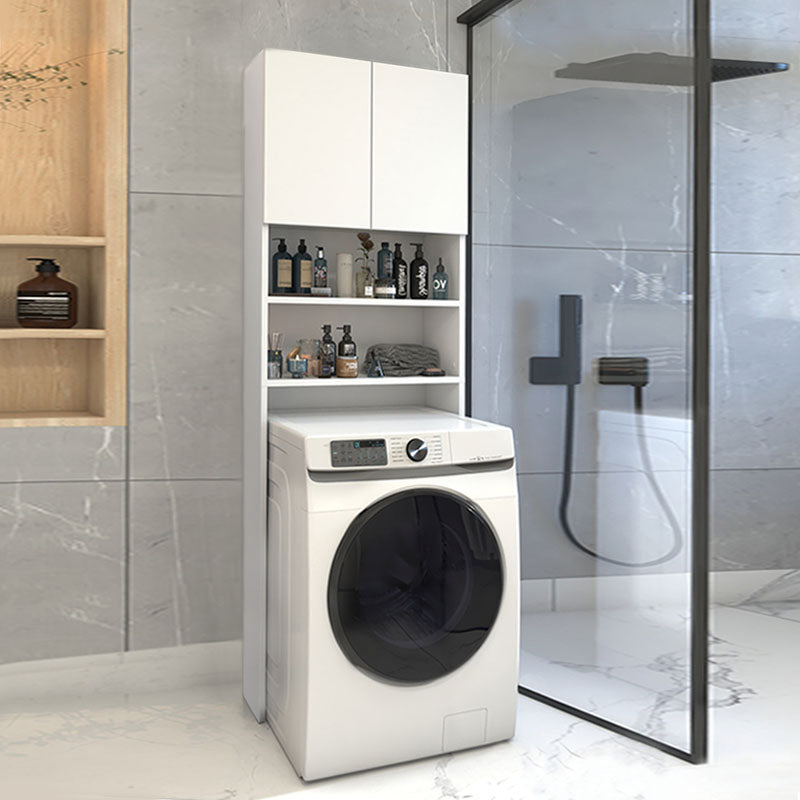 Buffet washing machine ENEA in white melamine finish, featuring two shelves and a double-leaf cabinet, ideal for laundry organization.