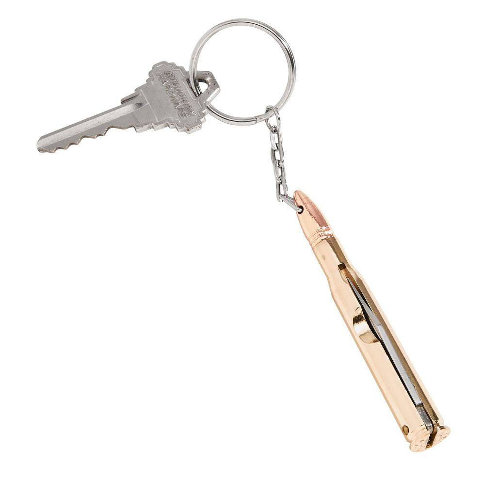 Bullet shaped keychain with knife, featuring brass tone finish and copper tone tip, resembling an AK-47 bullet.