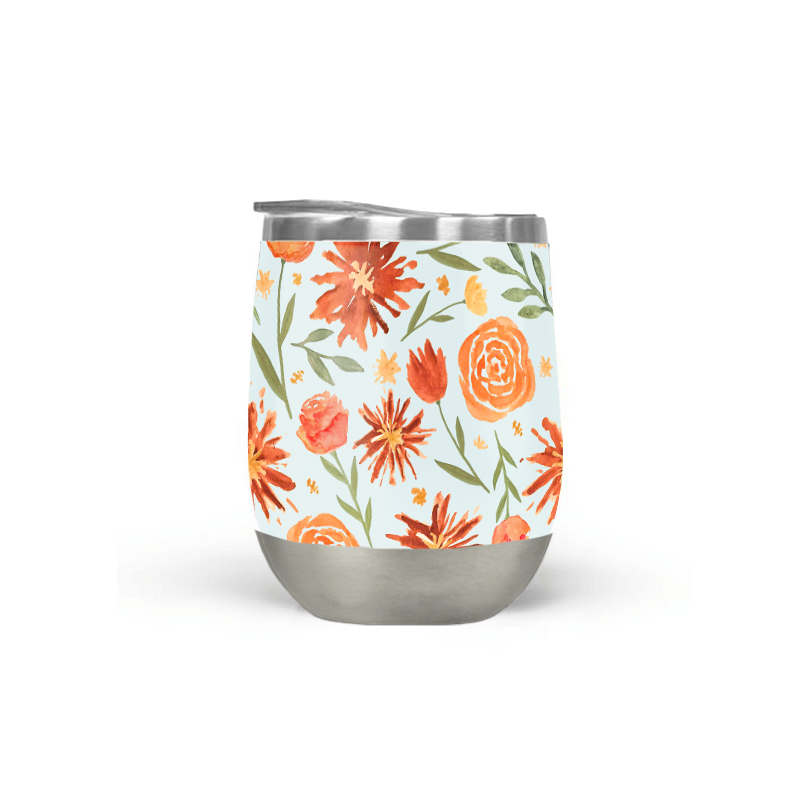 Burnt Orange Flower Burst Wine Tumbler with floral design, showcasing its vibrant color and stainless steel construction.