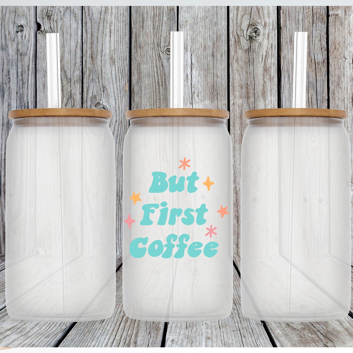 But First Coffee Glass Can Tumbler with bamboo lid and clear straw, showcasing a frosted glass design.