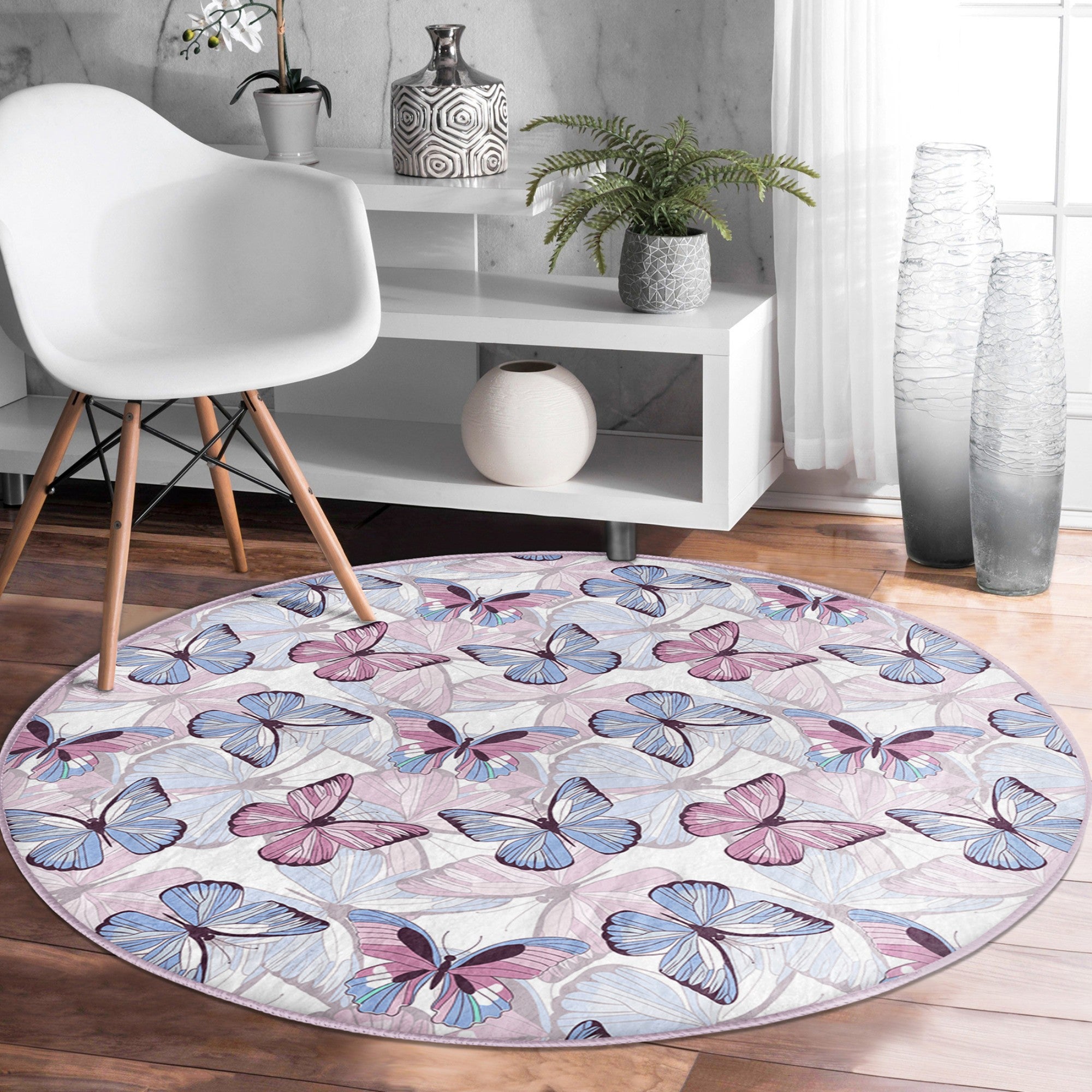 A beautifully designed round rug featuring a vibrant butterflies pattern, made from soft velvet fabric, perfect for bedroom decor.