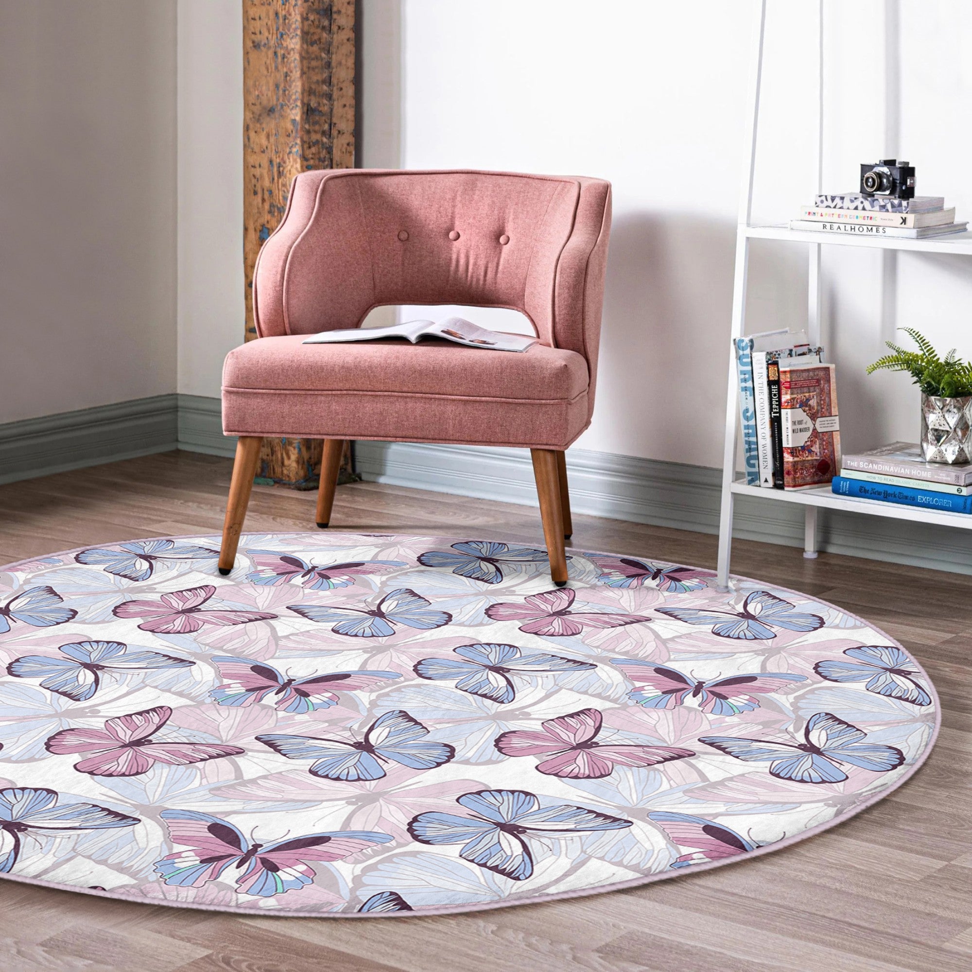 A beautifully designed round rug featuring a vibrant butterflies pattern, made from soft velvet fabric, perfect for bedroom decor.