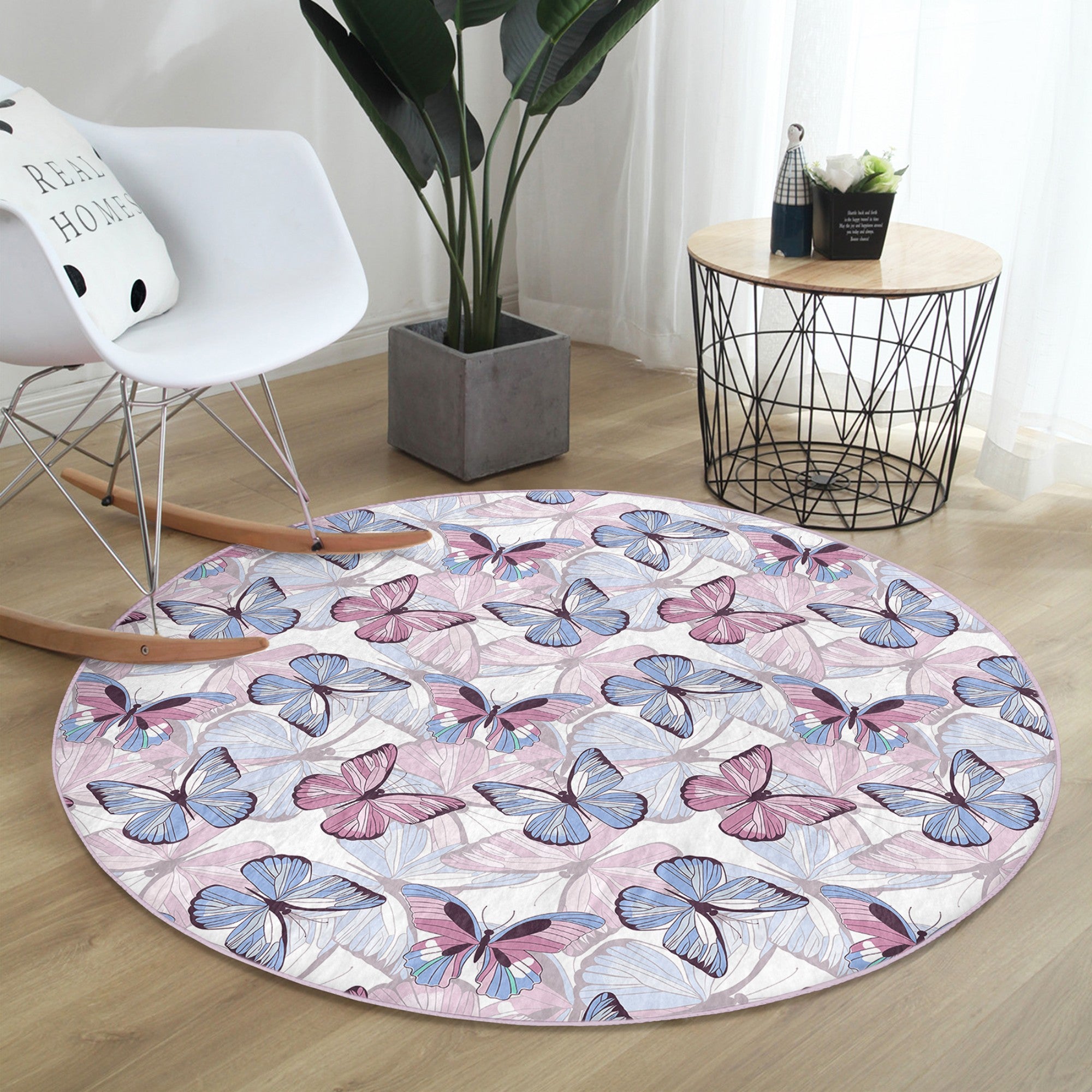 A beautifully designed round rug featuring a vibrant butterflies pattern, made from soft velvet fabric, perfect for bedroom decor.