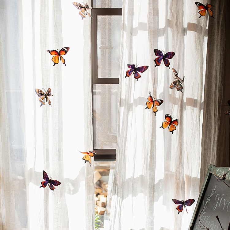 A colorful set of 5 handmade butterfly clips, showcasing various vibrant designs and patterns, perfect for hair accessories.