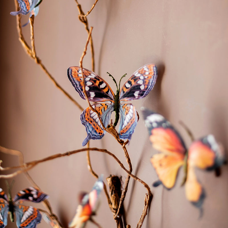 A colorful set of 5 handmade butterfly clips, showcasing various vibrant designs and patterns, perfect for hair accessories.