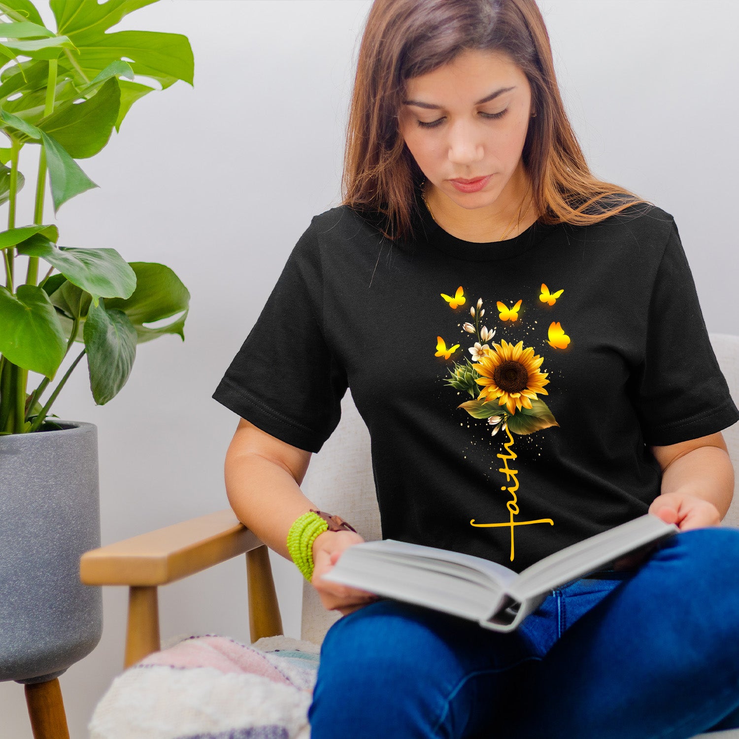 Butterfly Faith Sunflower T-shirt featuring a vibrant sunflower graphic on a soft fabric background, perfect for casual wear.