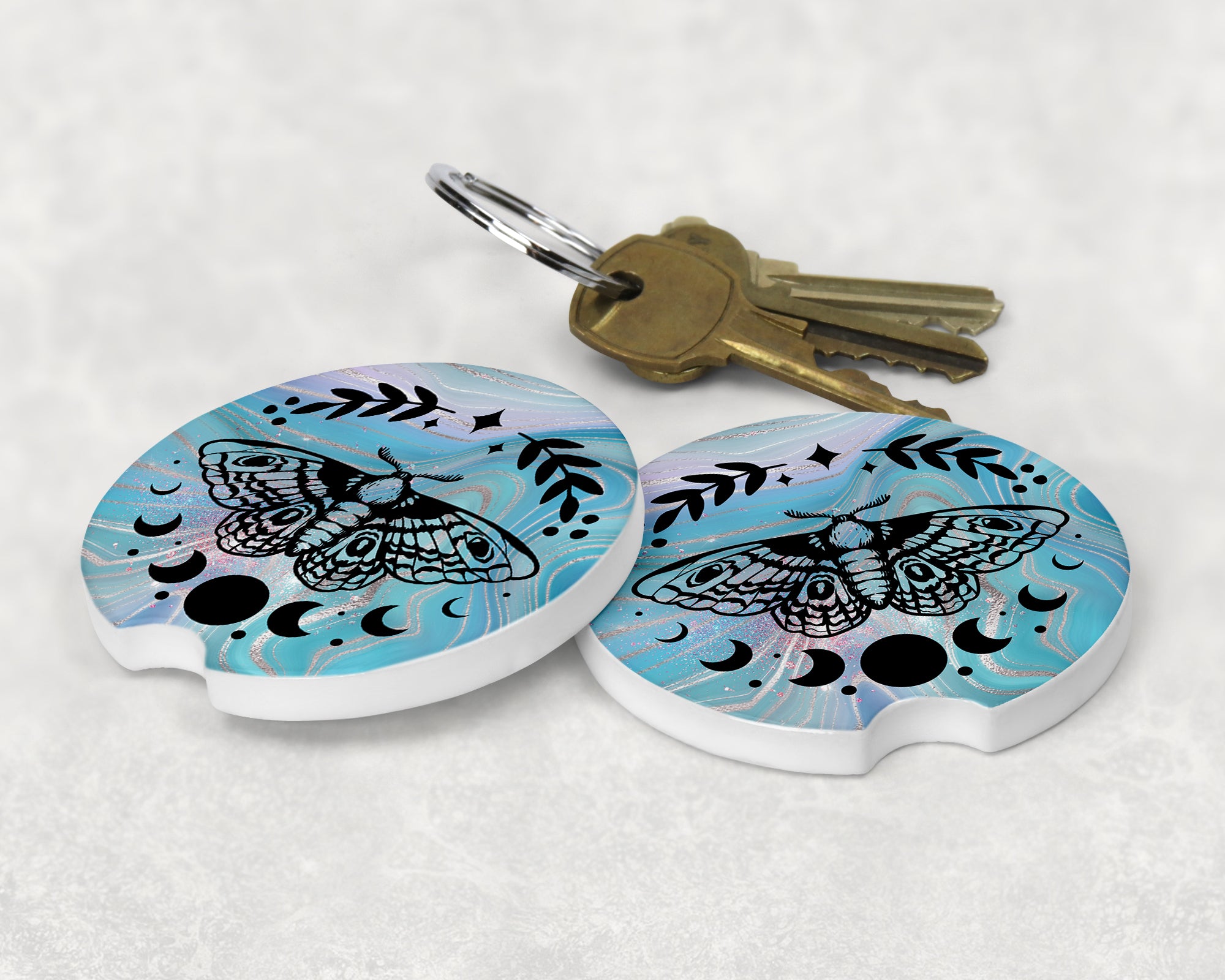 Butterfly Moon Phases Car Coaster featuring a stylish design, made of absorbent sandstone, perfect for drink holders.