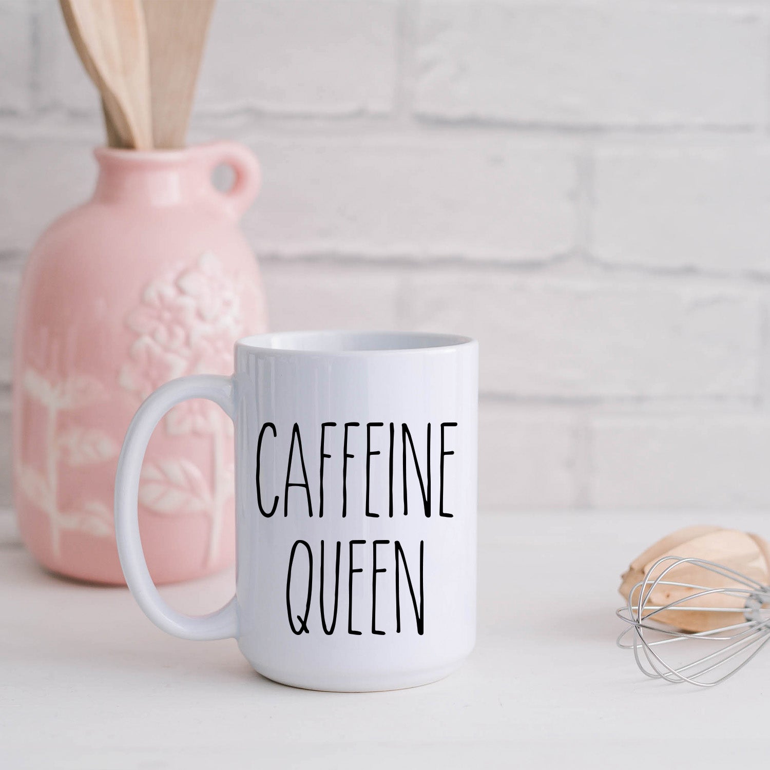 Caffeine Queen 15oz Mug with glossy finish and vibrant print, perfect for coffee and tea.