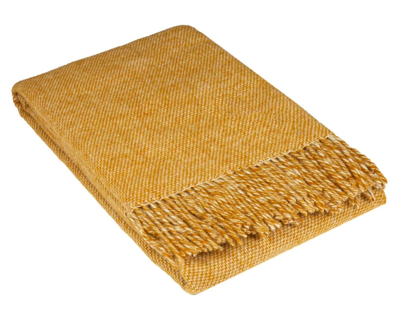 Cozy Cambridge Throw blanket made from 100% New Zealand wool in mustard color, elegantly draped on a sofa.