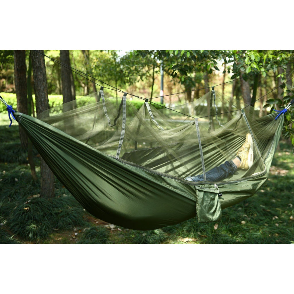 Camping hammock with built-in mosquito net, showcasing its spacious design and durable parachute nylon fabric.