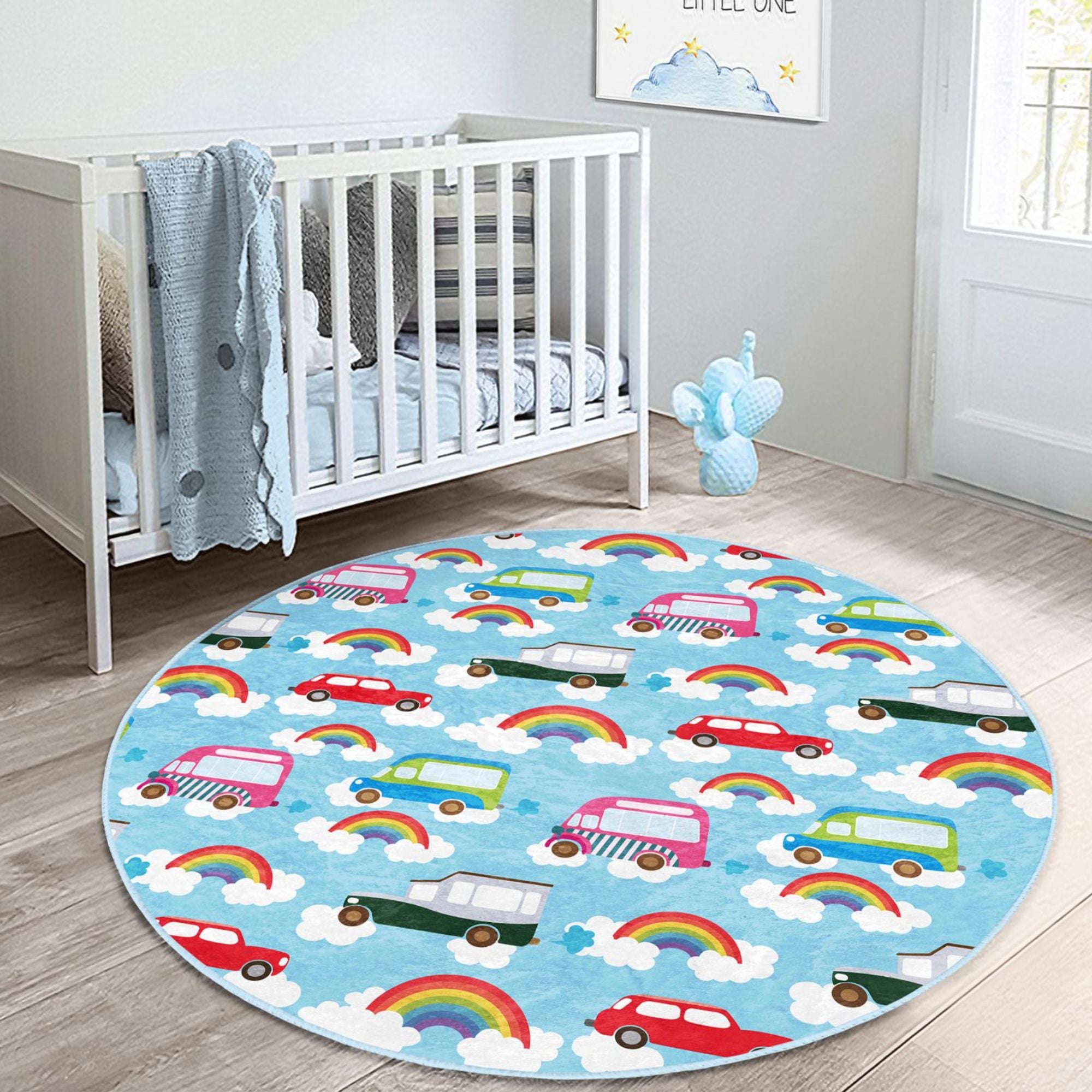 A vibrant blue round rug featuring colorful cars and rainbows, perfect for children's rooms, made from soft velvet fabric.